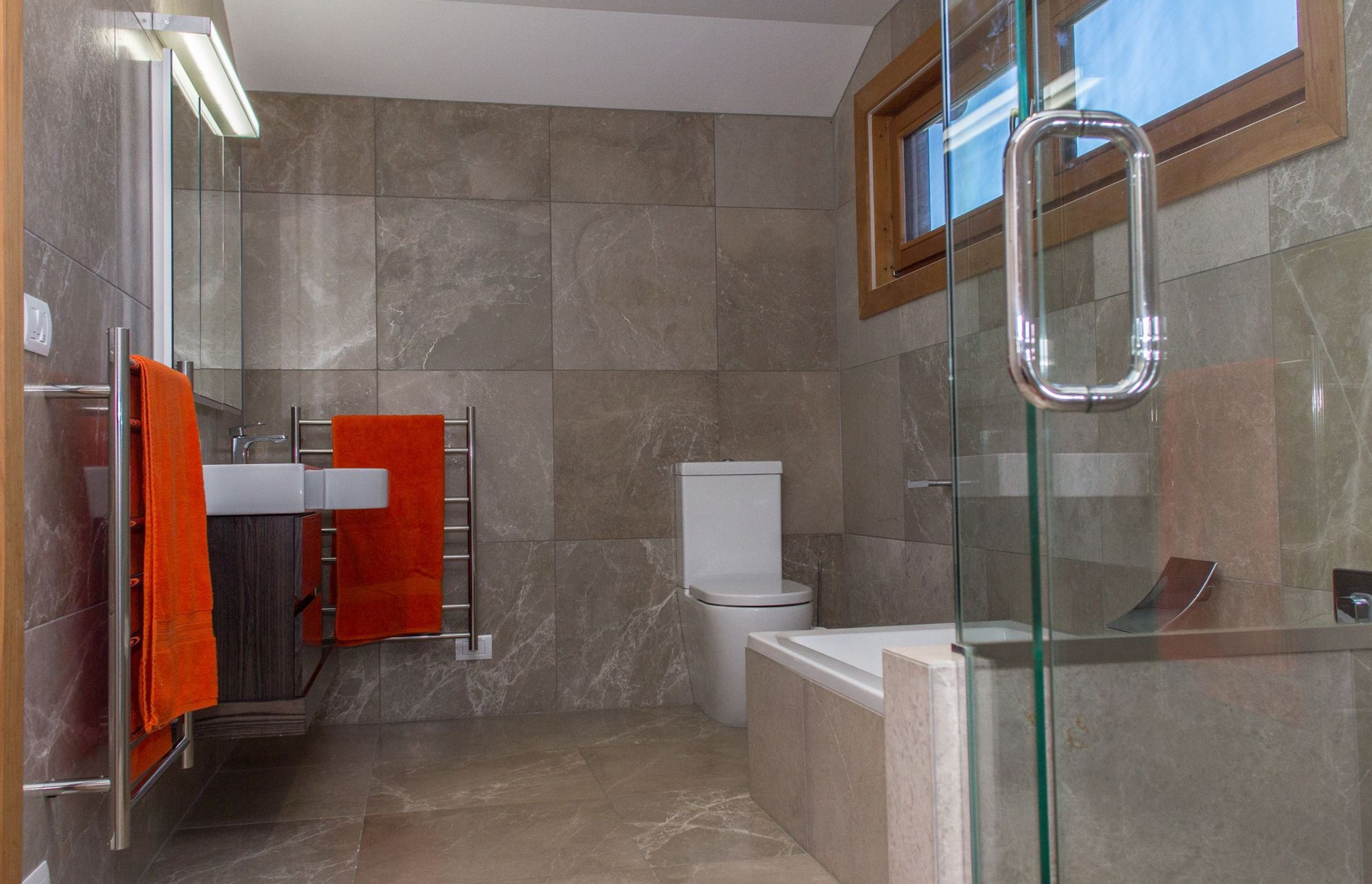 Well appointed bathrooms enhance the quality of the home.