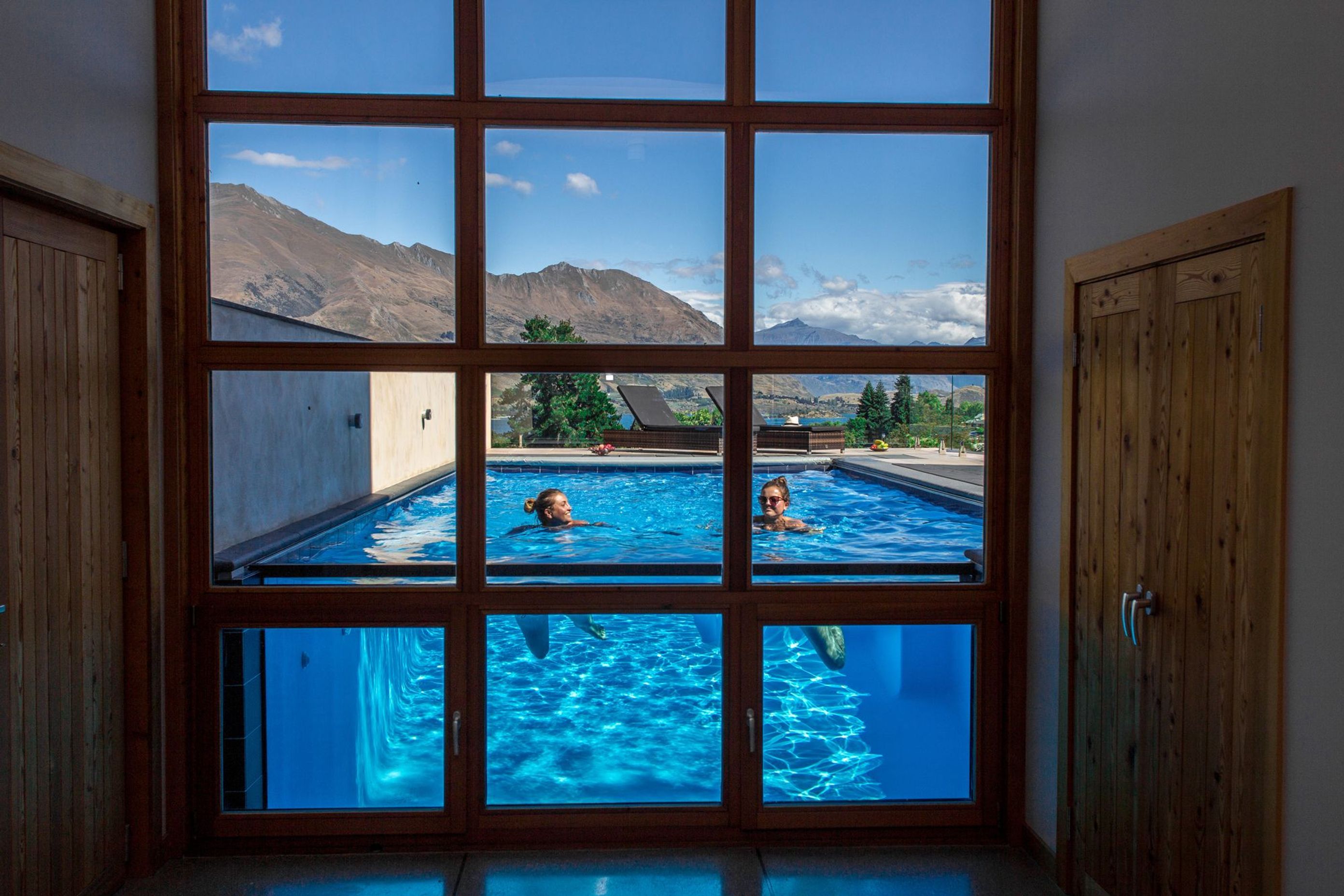 The pool is visible through the window; in the afternoon a beautiful light display occurs on the floor.