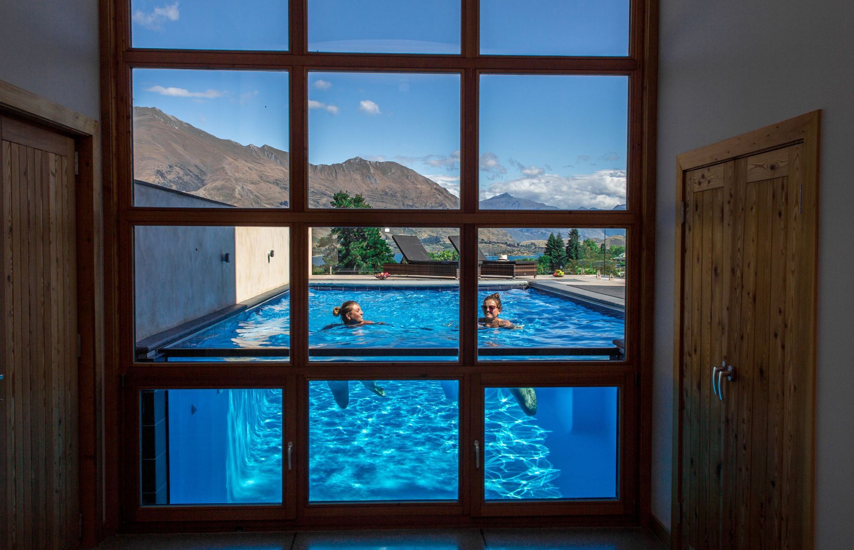 The pool is visible through the window; in the afternoon a beautiful light display occurs on the floor.