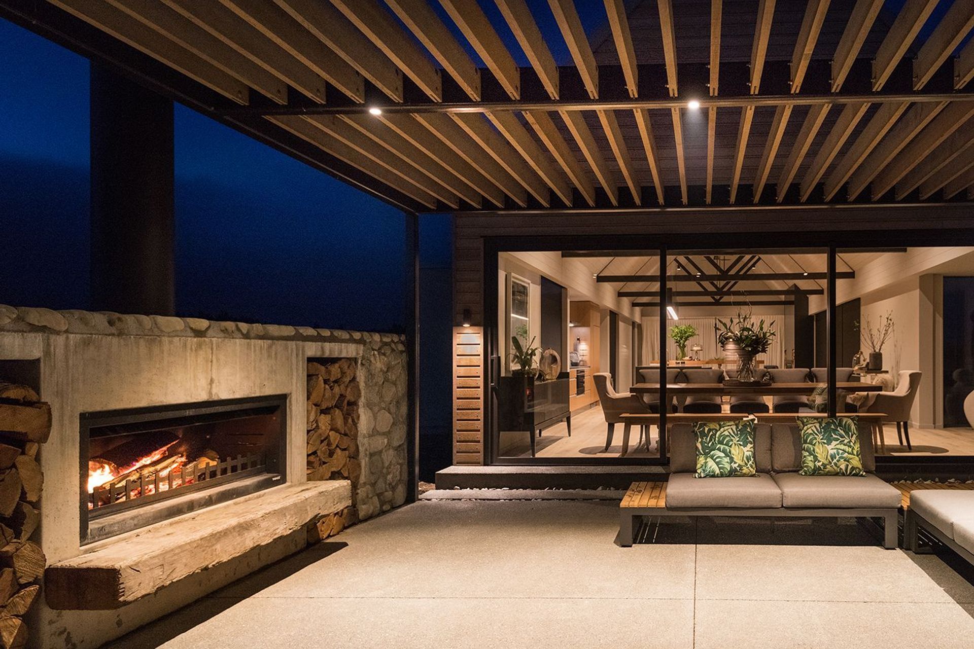 Outdoor area with stunning fireplace