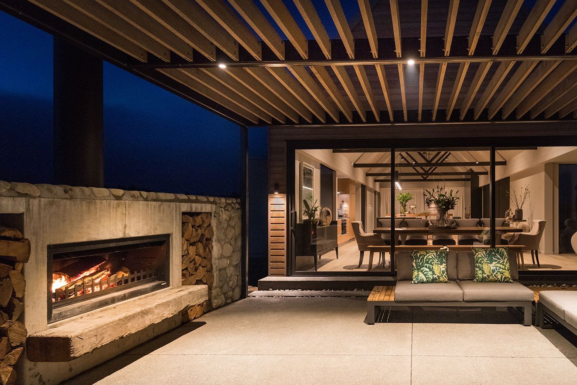Outdoor area with stunning fireplace