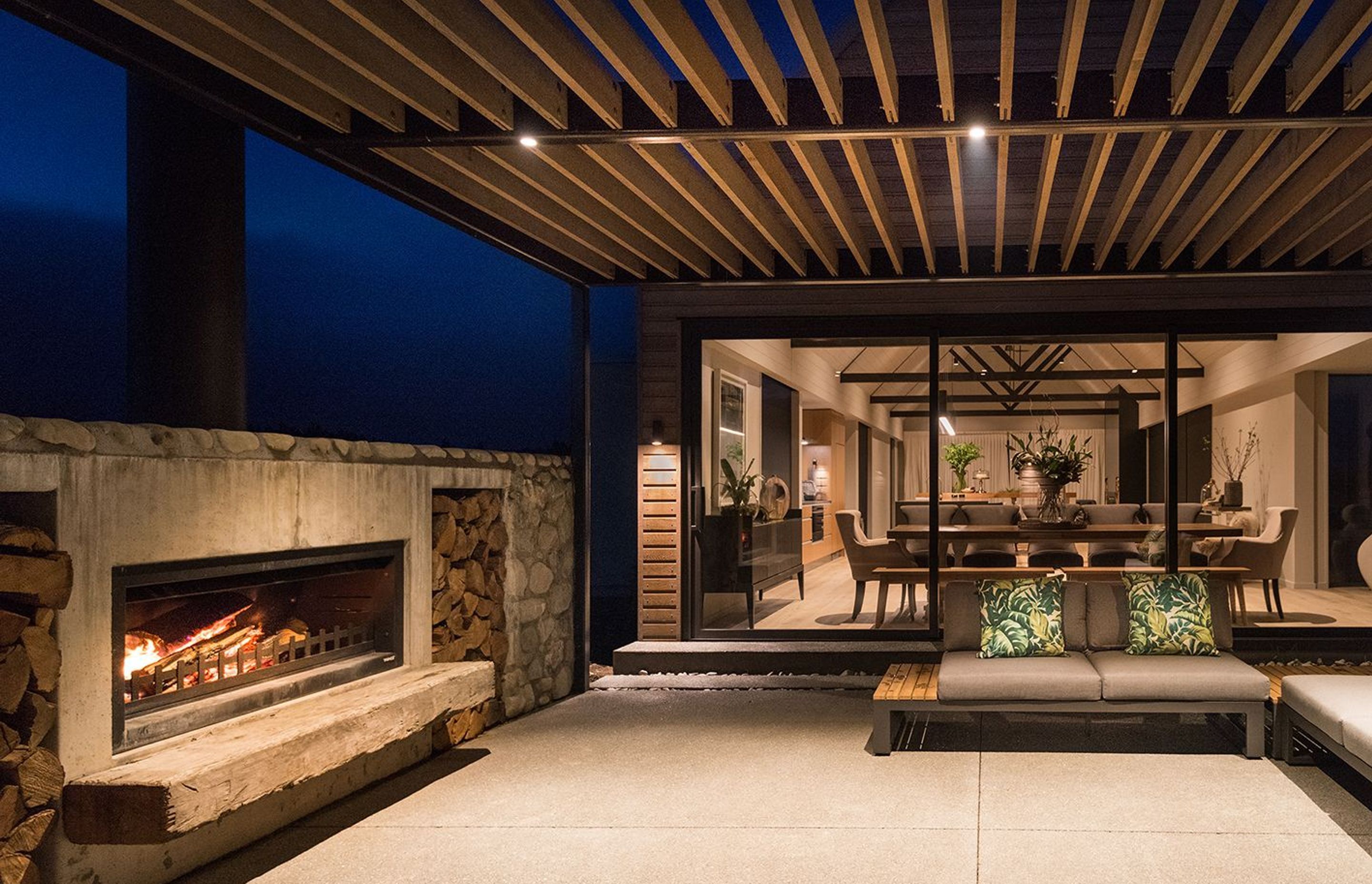 Outdoor area with stunning fireplace
