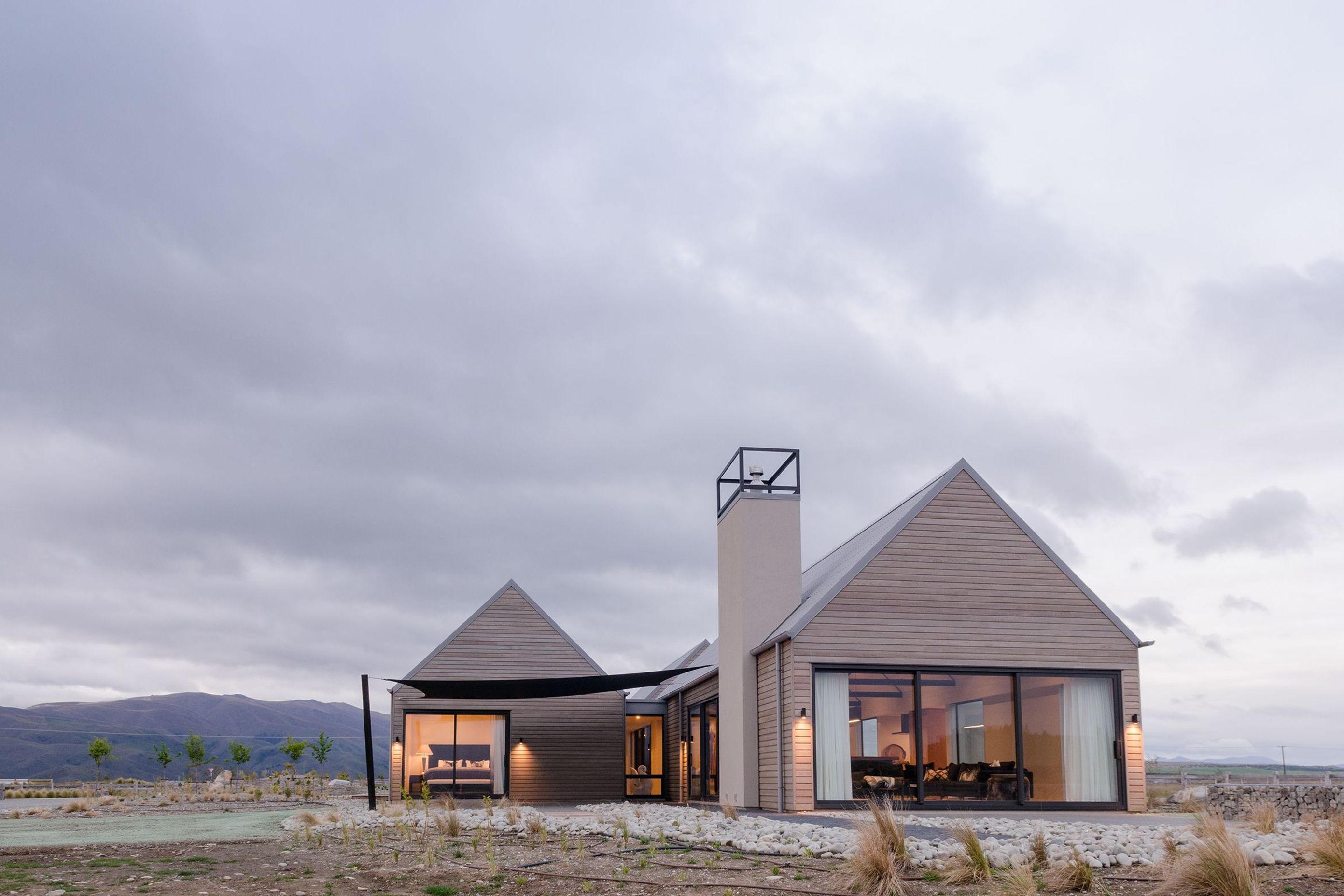 The home nestles nicely into the iconic golden setting of the MacKenzie Country. 