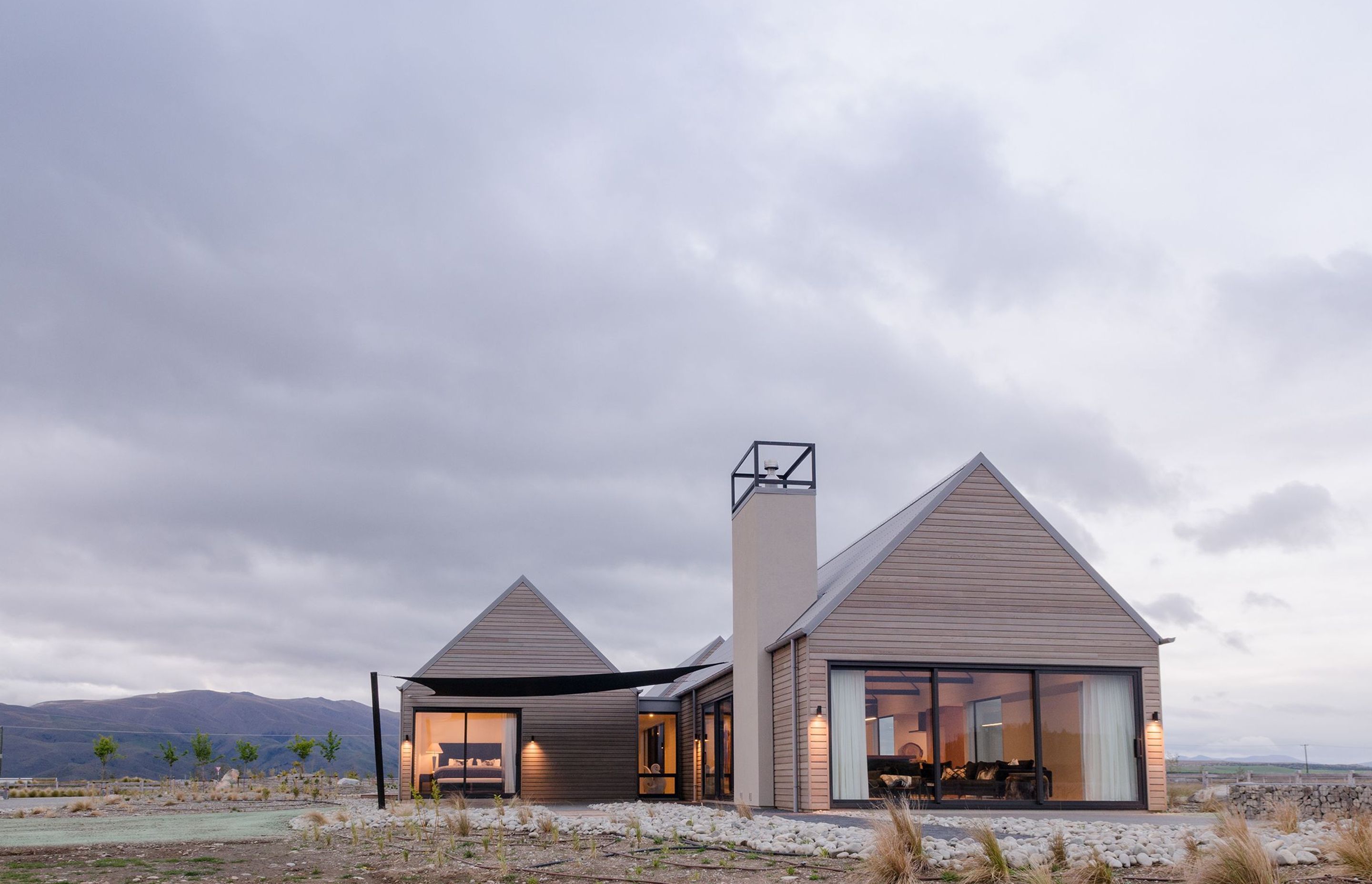 The home nestles nicely into the iconic golden setting of the MacKenzie Country.