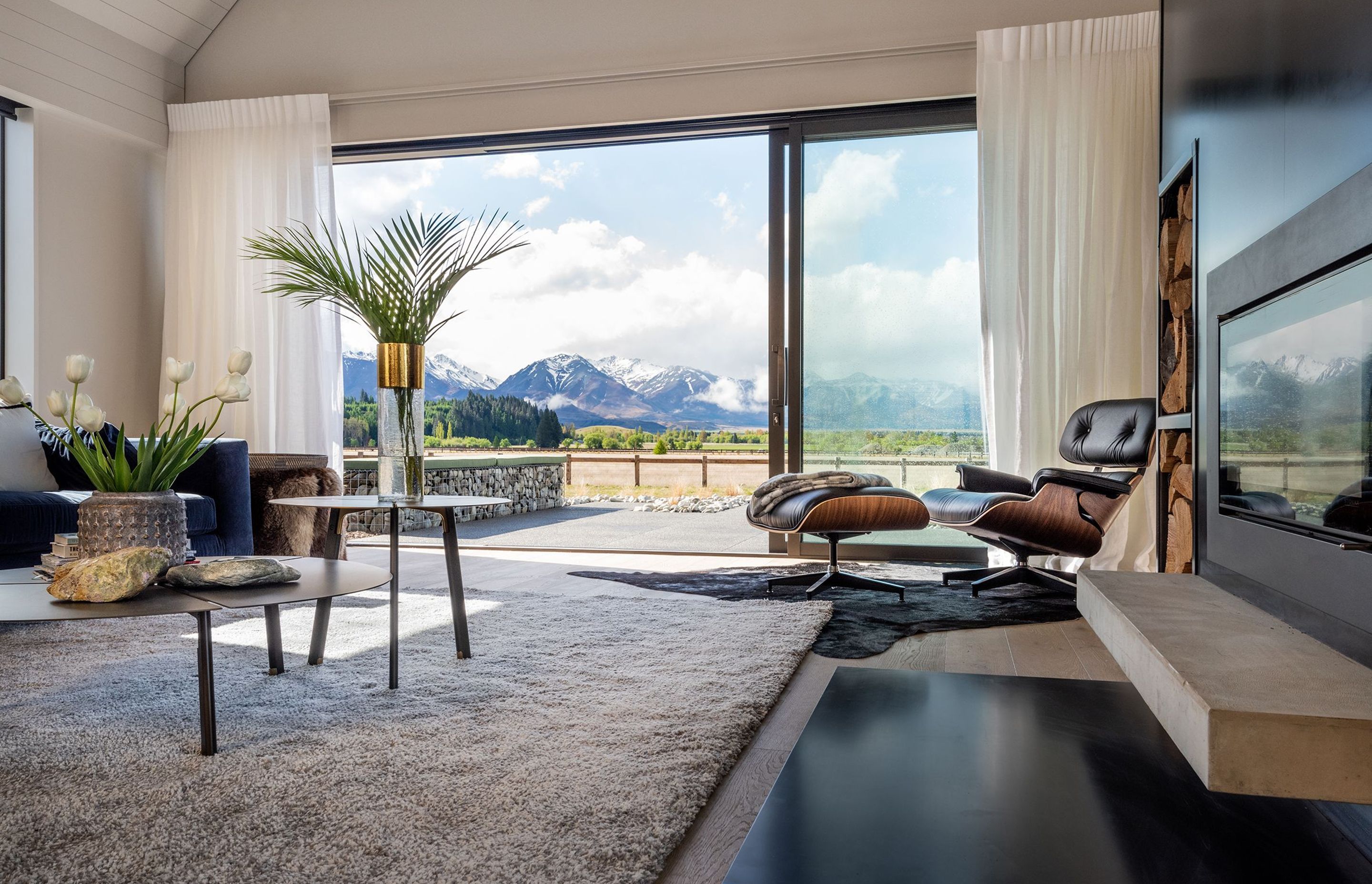 Living room leading seamlessly to one of three outdoor areas