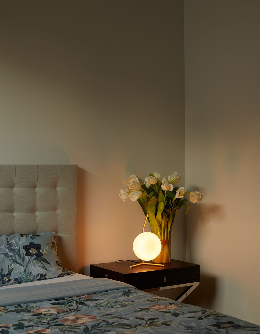 A private retreat, the guest bedroom is nestled into the back of the house.