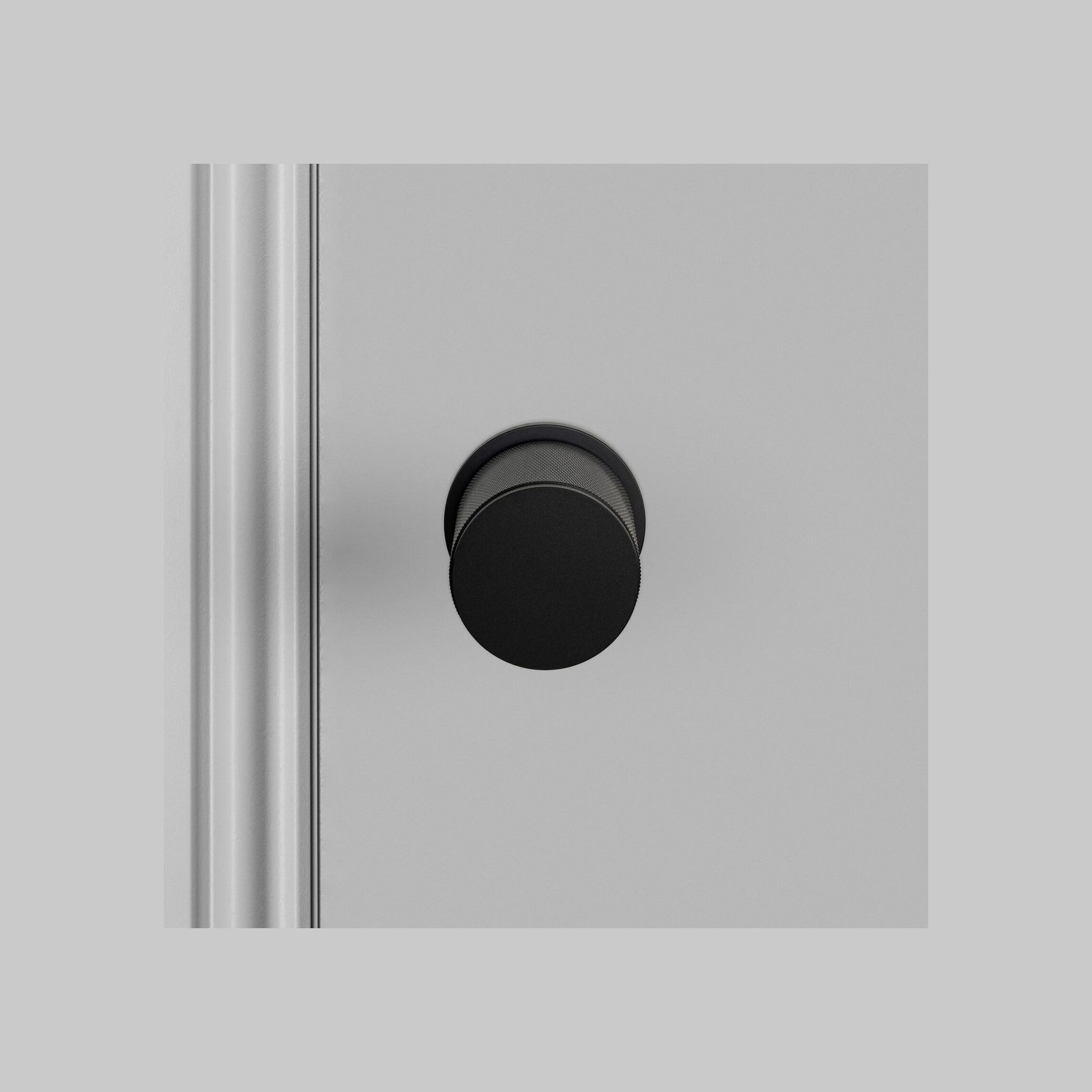 Buster and Punch Cross-Knurl Door Knob on Round Rose