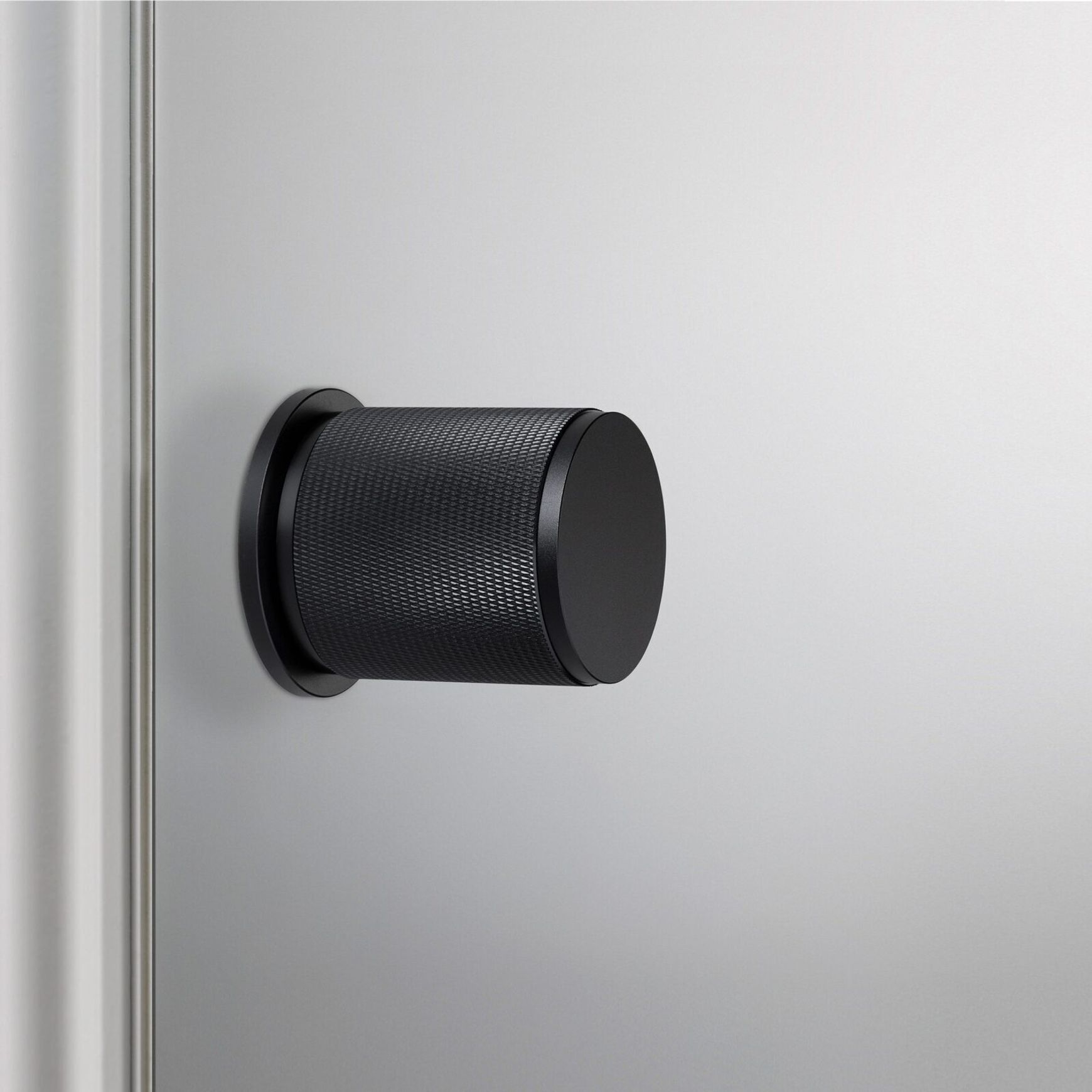 Buster and Punch Cross-Knurl Door Knob on Round Rose