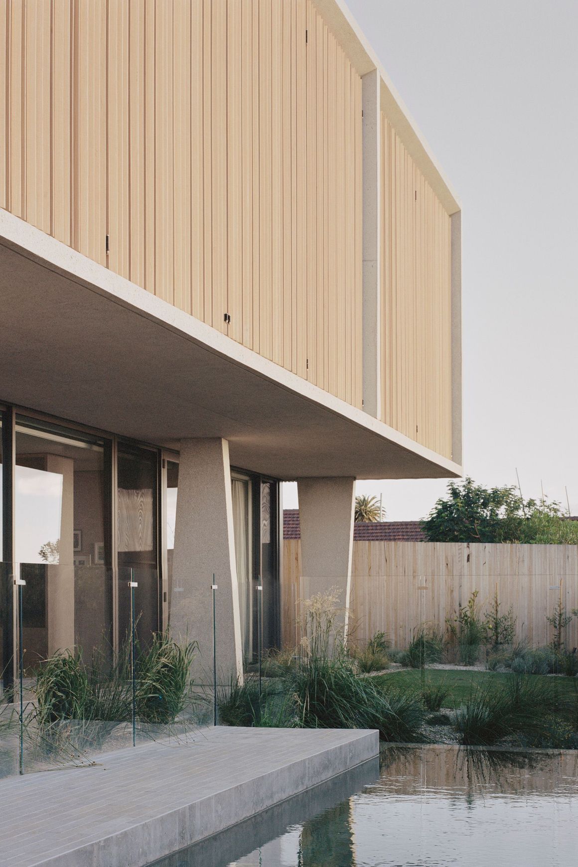 Motorised Vertical Bi-Fold Screens | Shade Factor