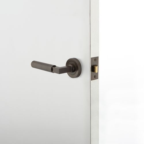 Iver Brunswick Door Lever Handle on Round Rose Passage