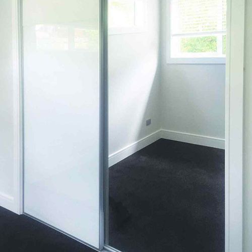 White Acrylic and Mirror Sliding Door With Double Tracks