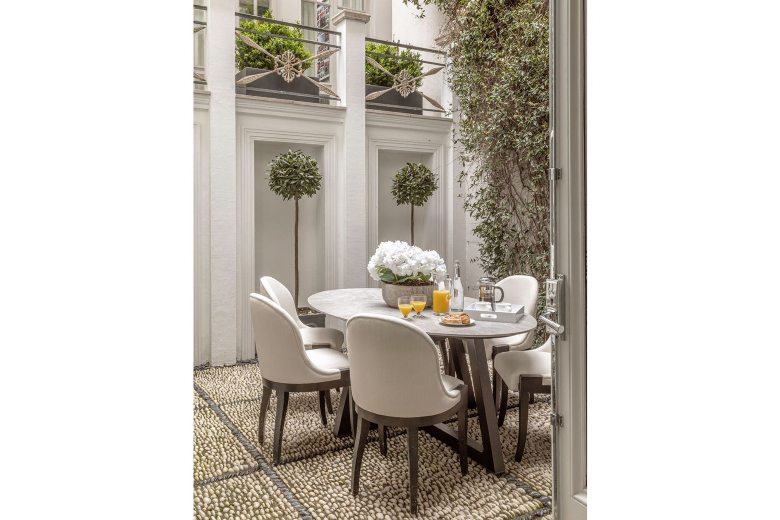 Corvus Porcelain Dining Table by Coco Wolf