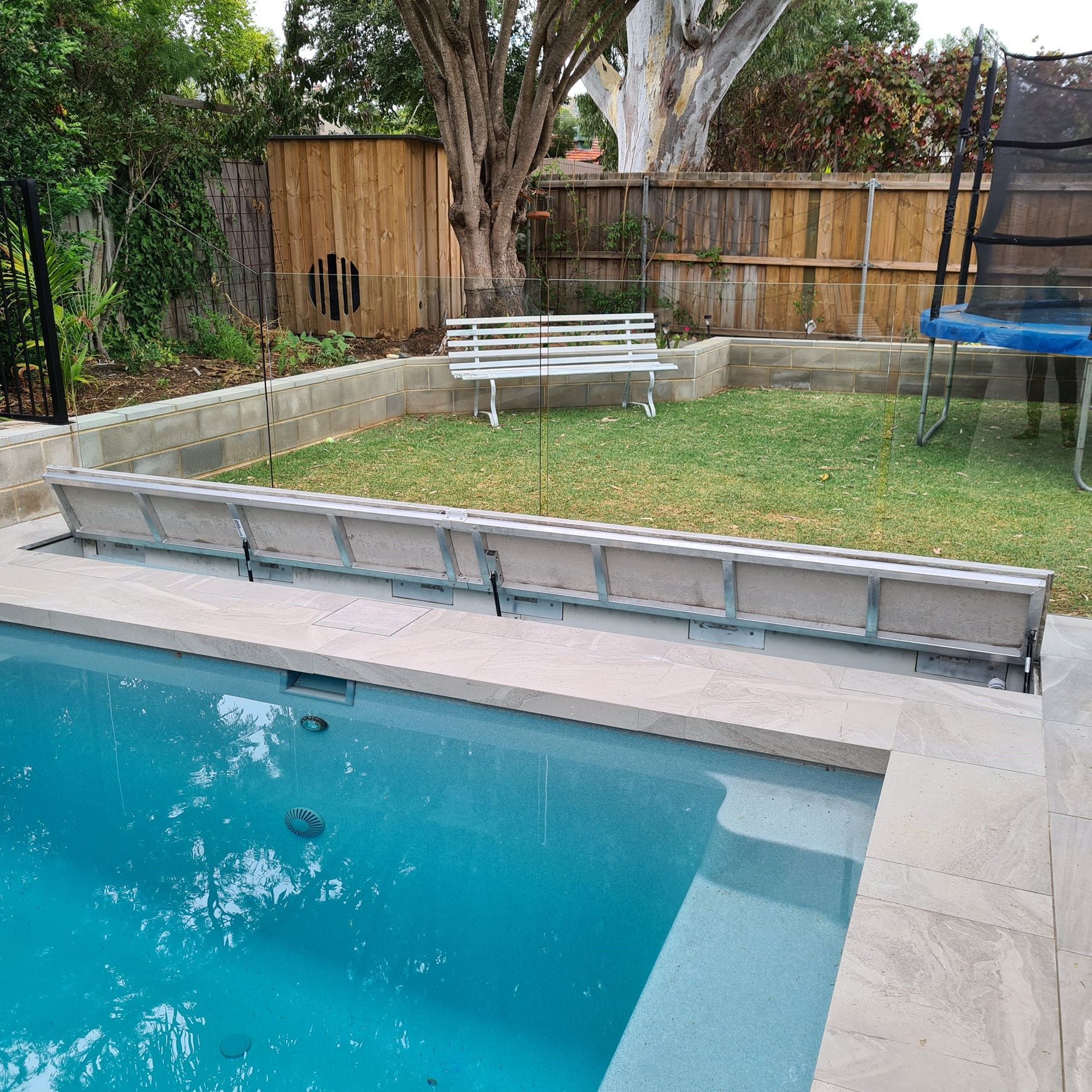 Concrete UnderCover® Concealed Pool Cover - Powered
