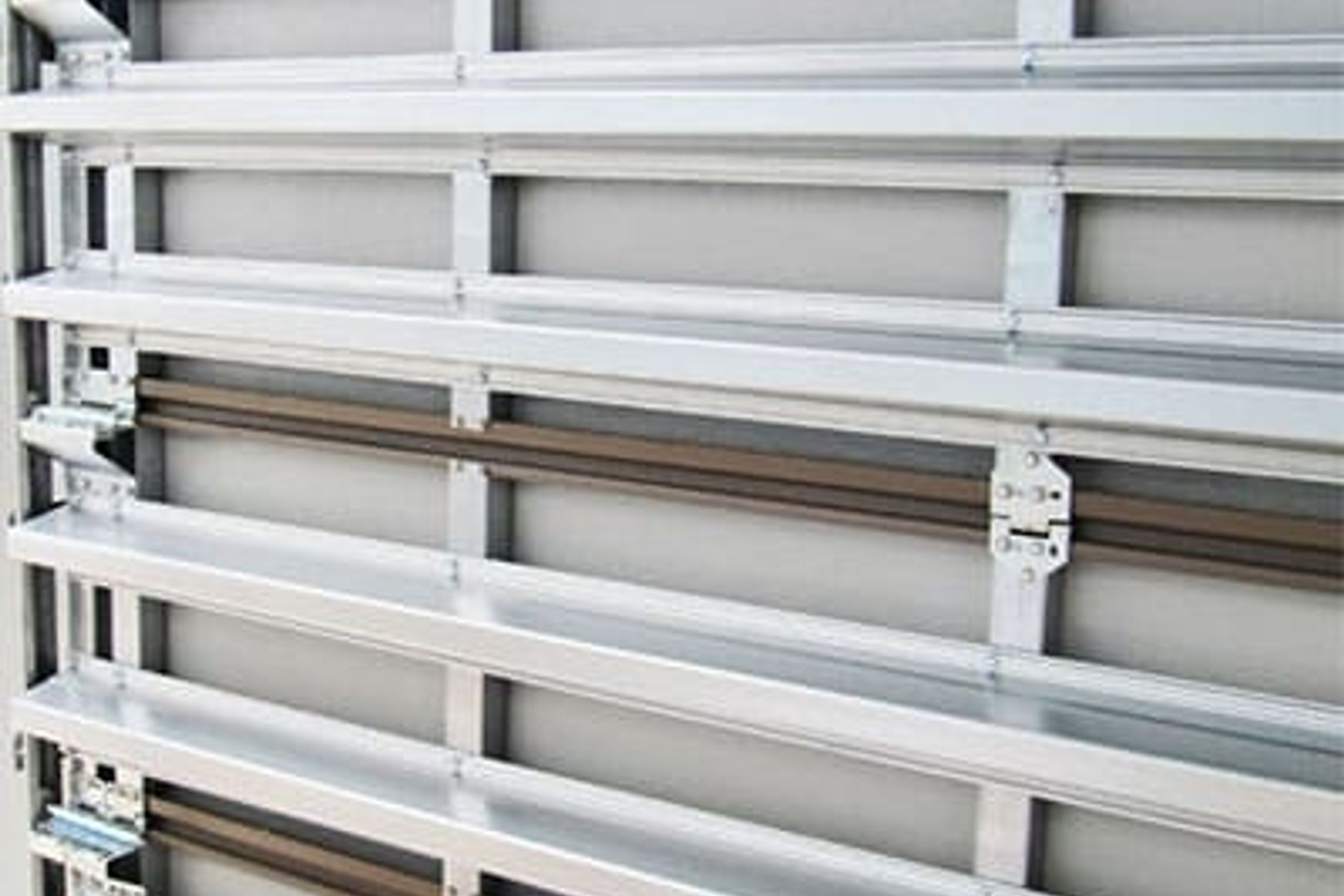 Strut-LockTM Wind Rated Sectional Doors | Cyclone Doors