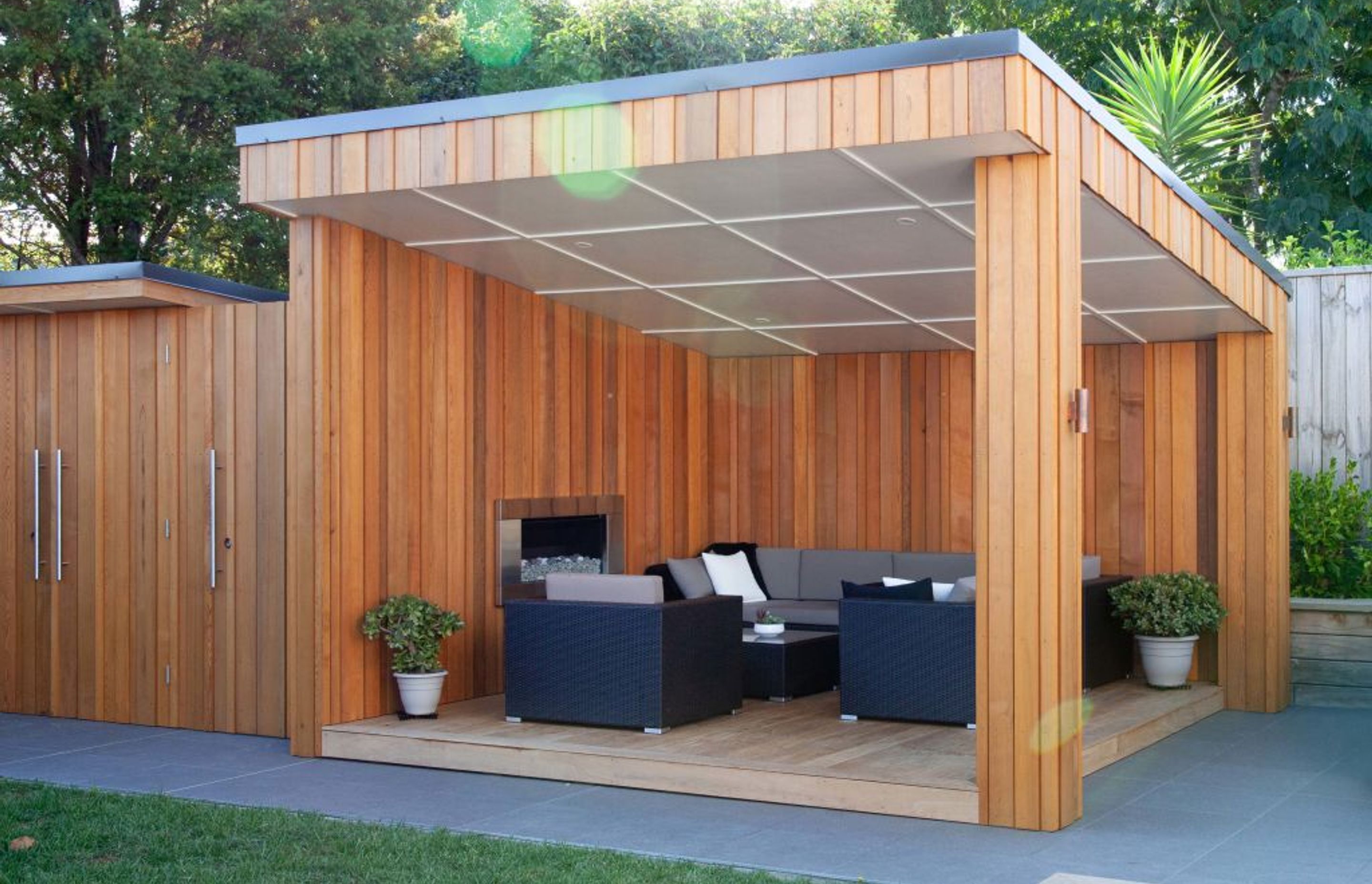 Cedar clad outside entertainment area with inbuilt fireplace