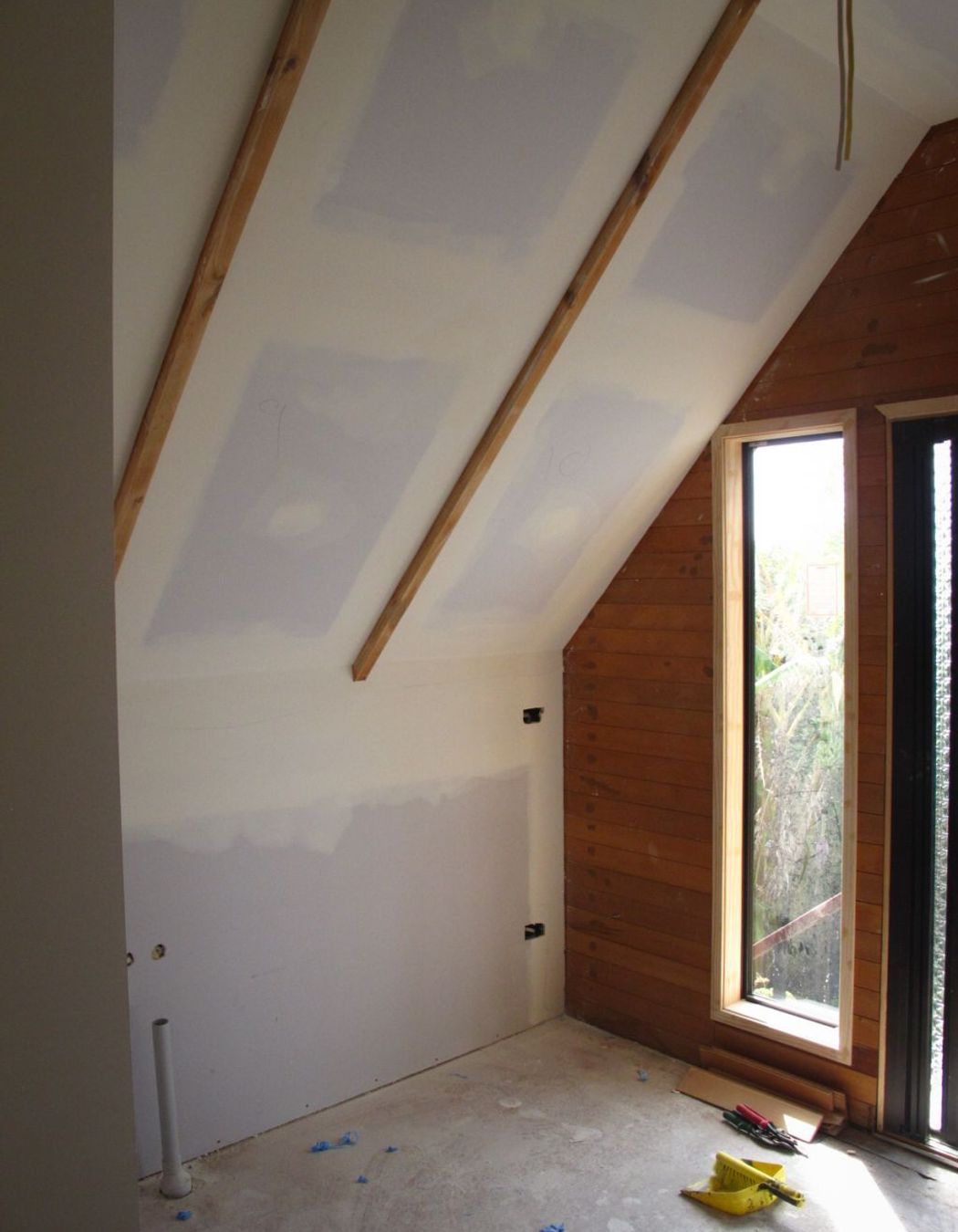 An Attic conversion on the Tutukaka Coast.  Kaiser Construction built a 1 bedroom apartment in the attic space above a garage