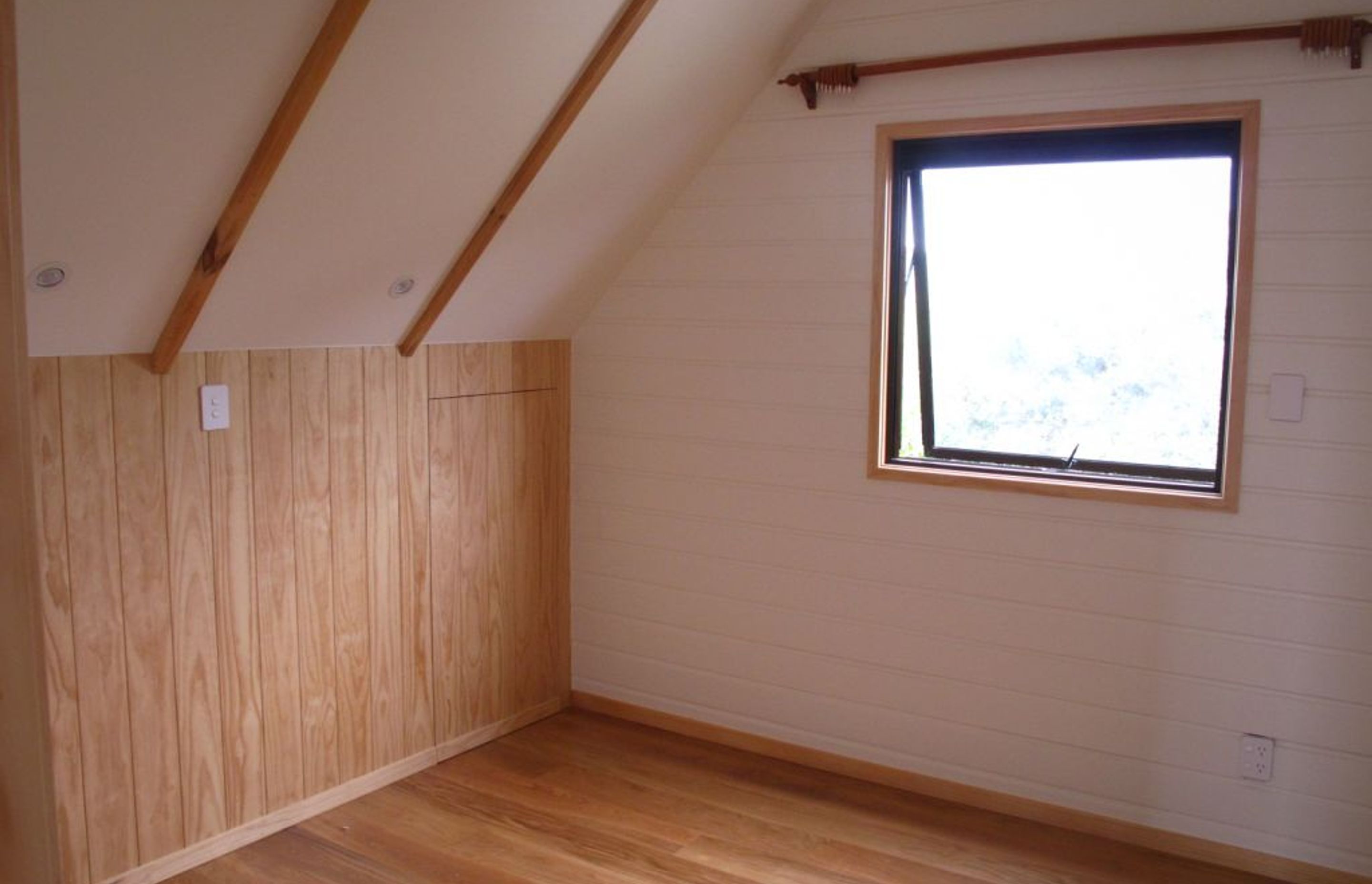 An Attic conversion on the Tutukaka Coast.  Kaiser Construction built a 1 bedroom apartment in the attic space above a garage