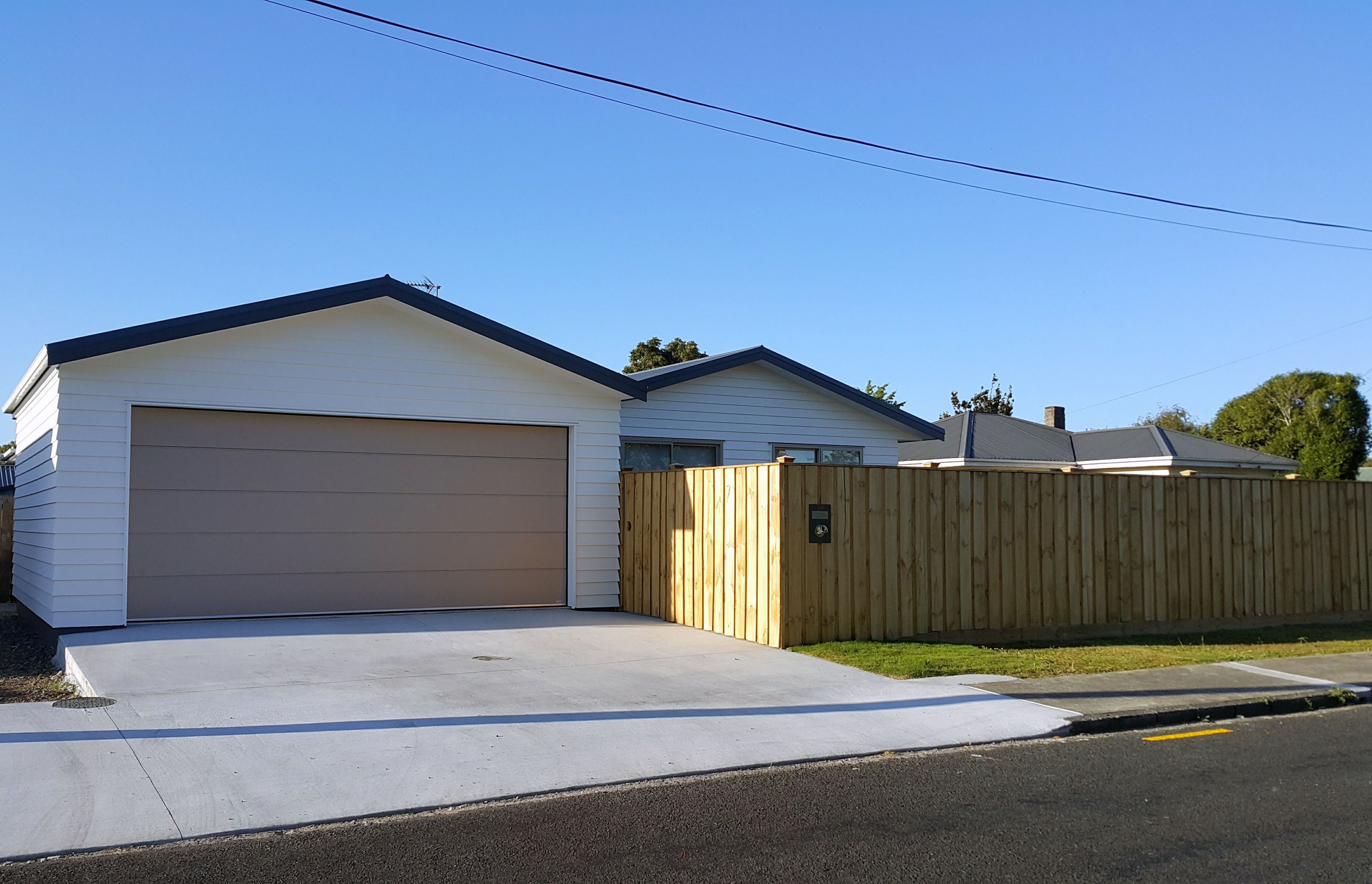 Front yard was sealed off with a double layered fence to prevent nosey neighbors
