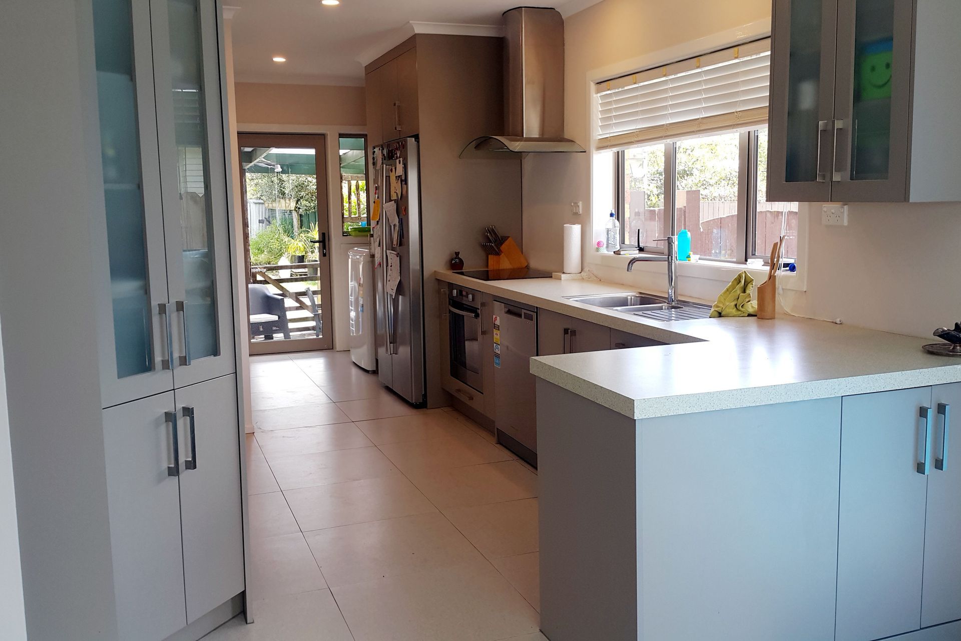 Lino is gone and new tiles to match throughout the house