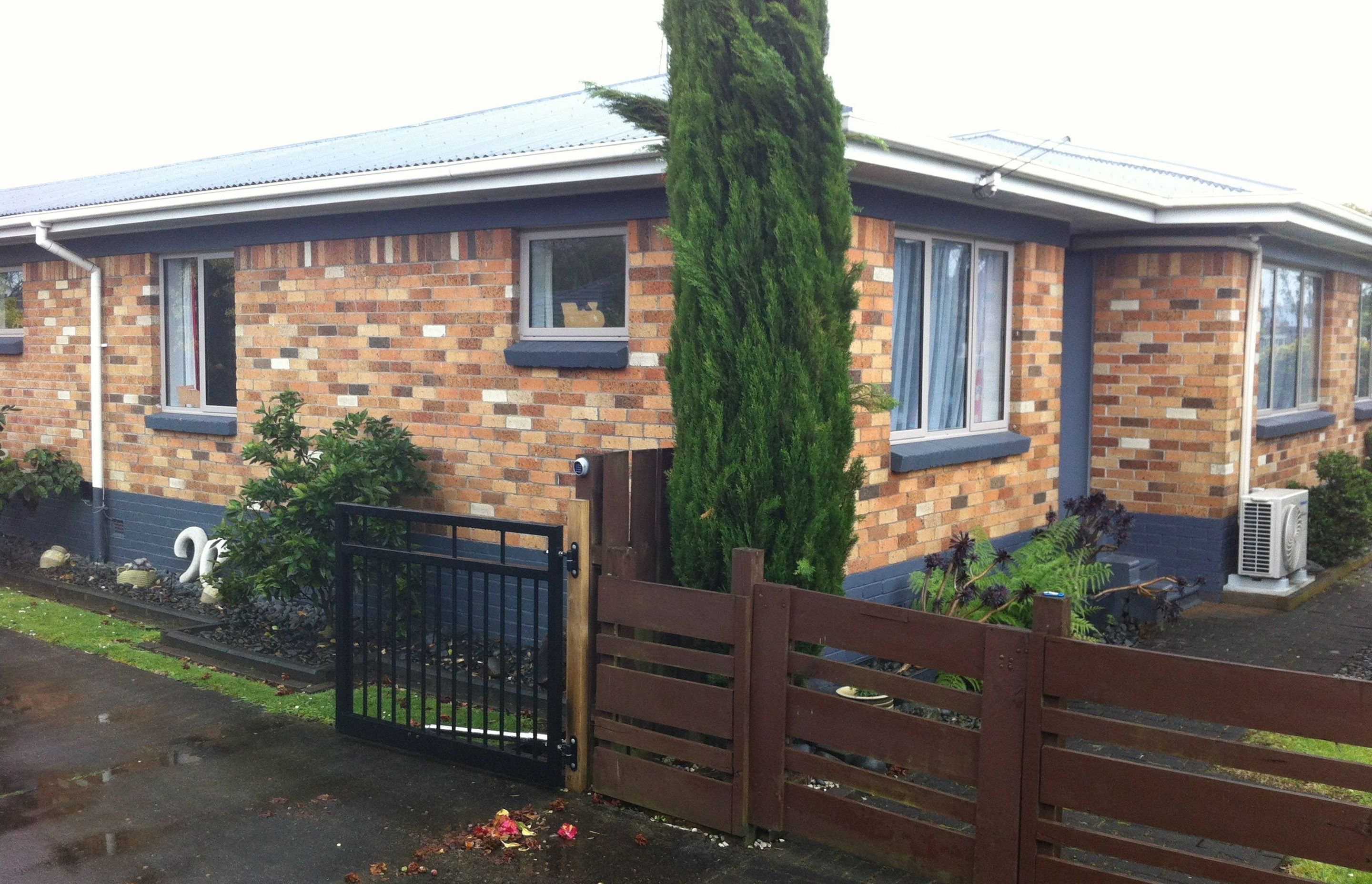 Brick front of house before the extention