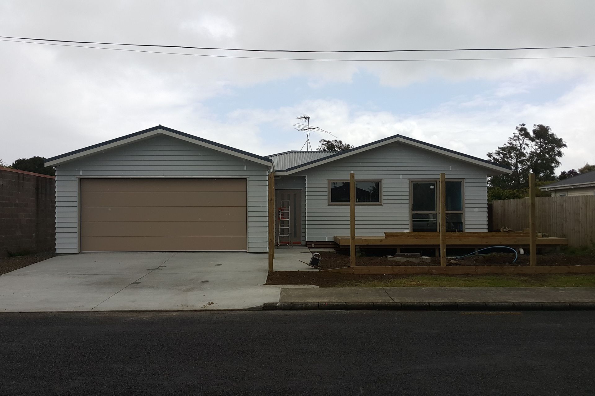 Front of House - We are ready to paint and put up the fence