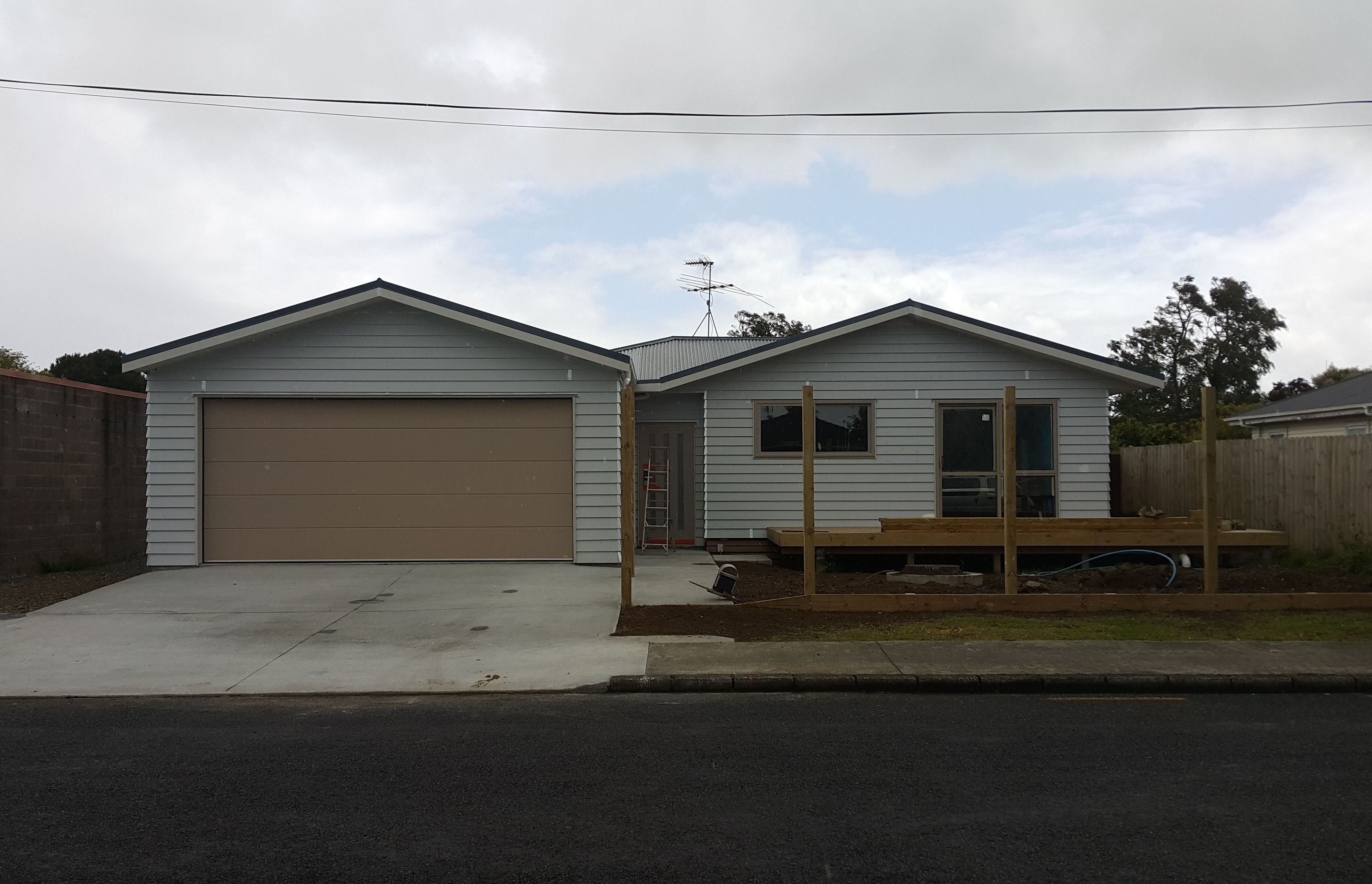 Front of House - We are ready to paint and put up the fence