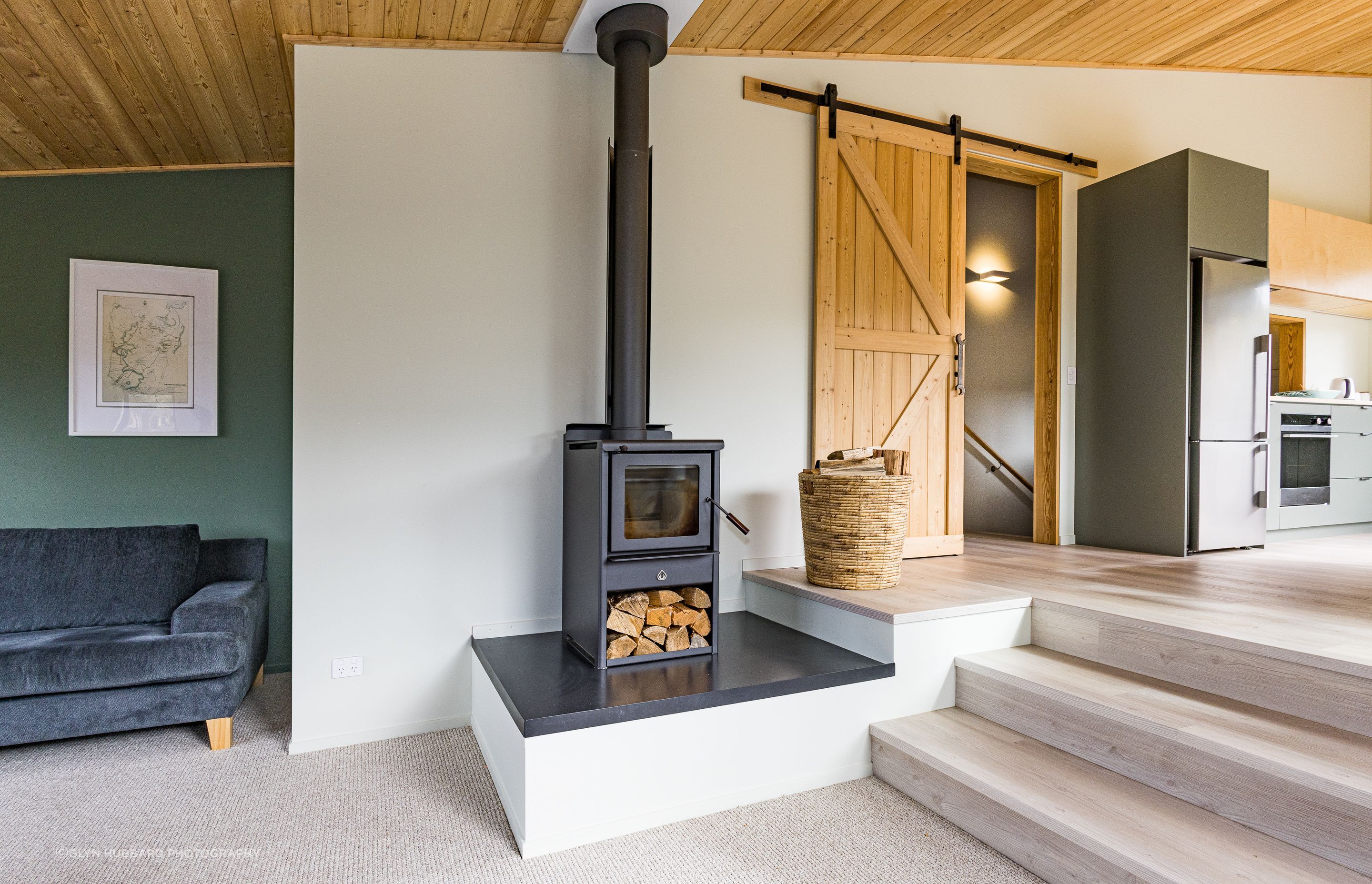 A wood burner adds ambience, and provides back-up heating.