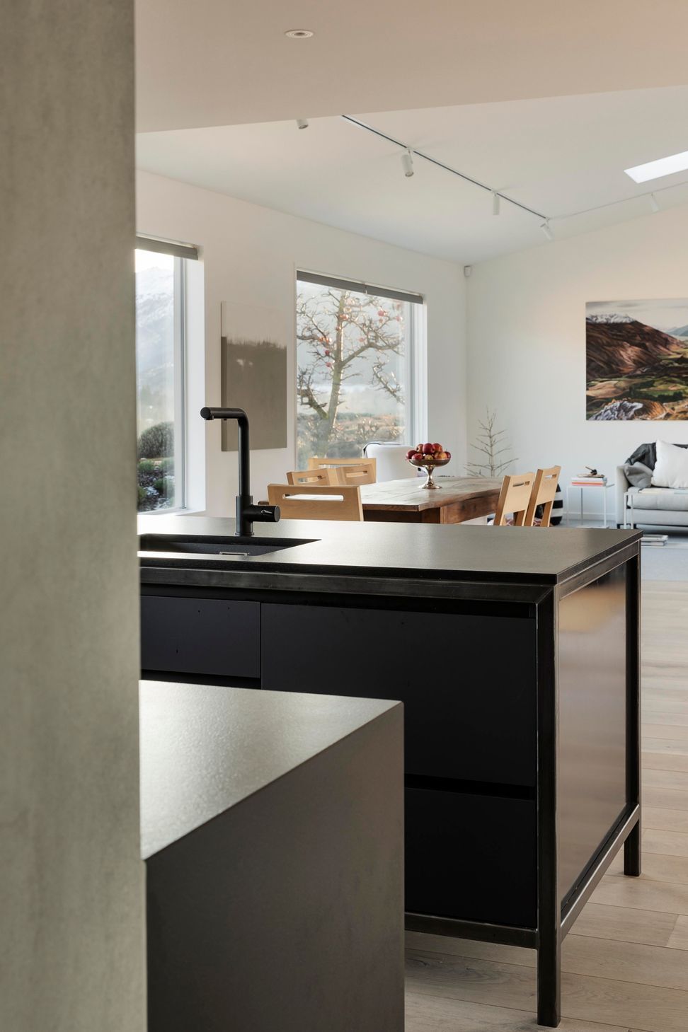 From the scullery, a view out to the kitchen and living spaces.