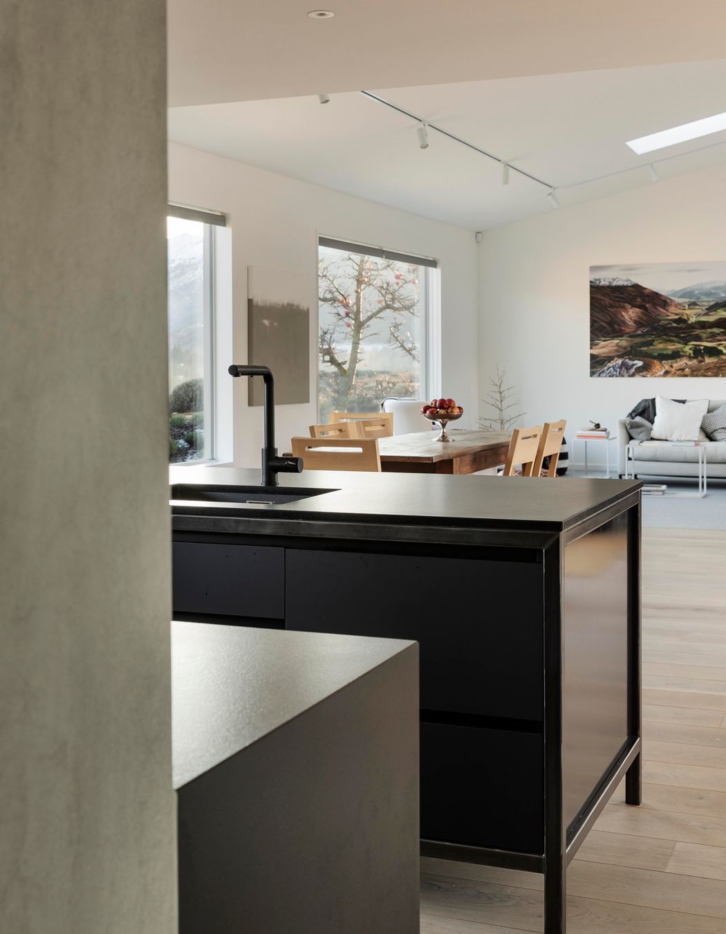 From the scullery, a view out to the kitchen and living spaces.