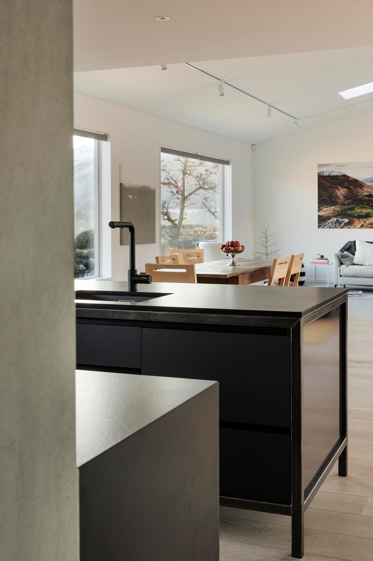 From the scullery, a view out to the kitchen and living spaces.