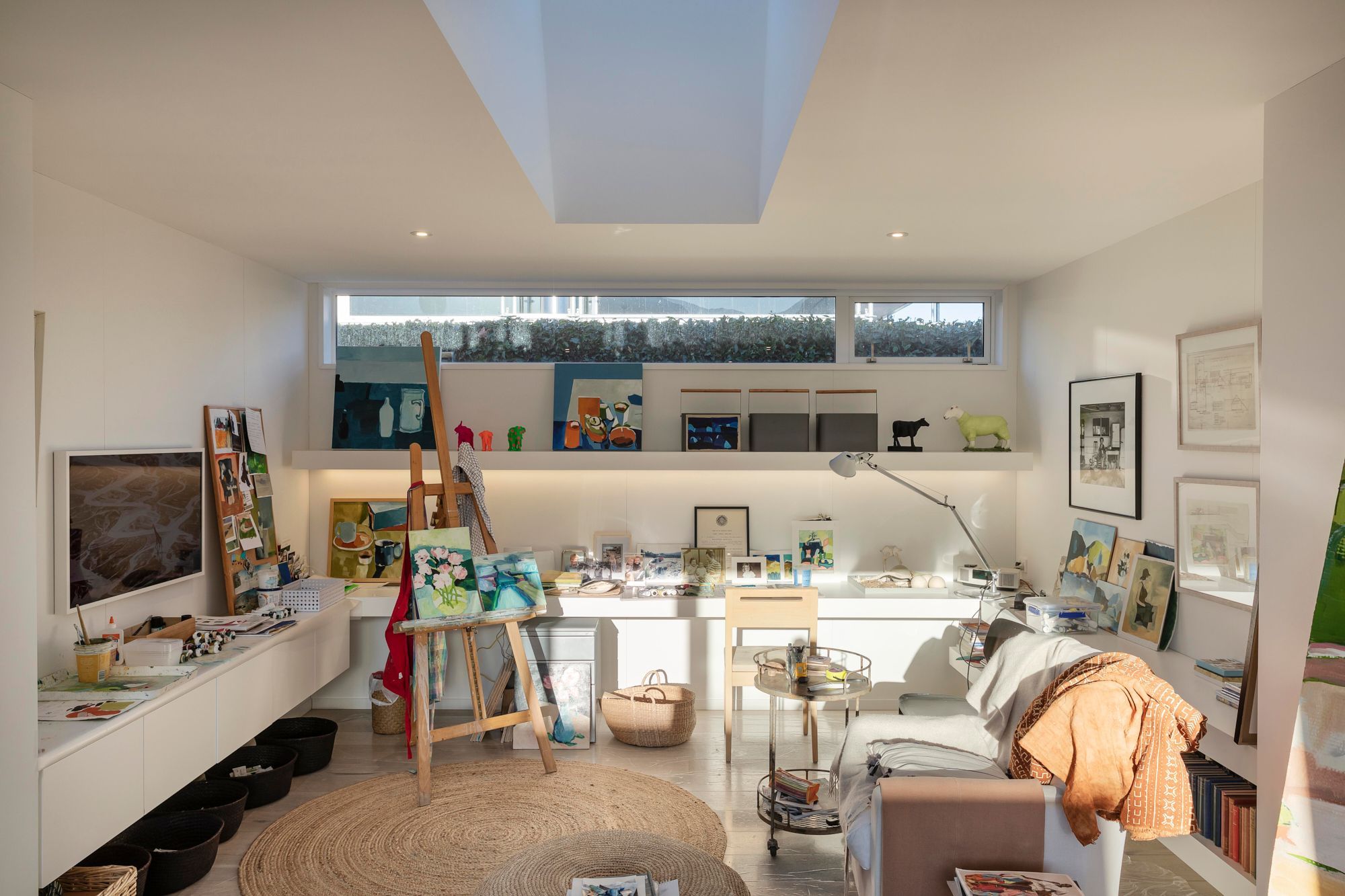Jane's studio features a high slot window that allows in ample light, but means privacy is retained.