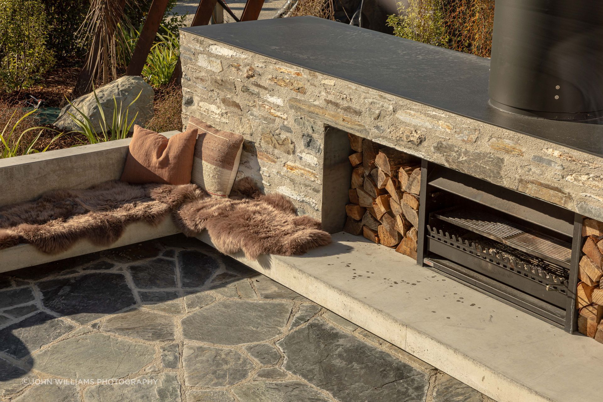 Ben-Hudson-Architects-gallery-house-outdoor-stone-fire.jpg