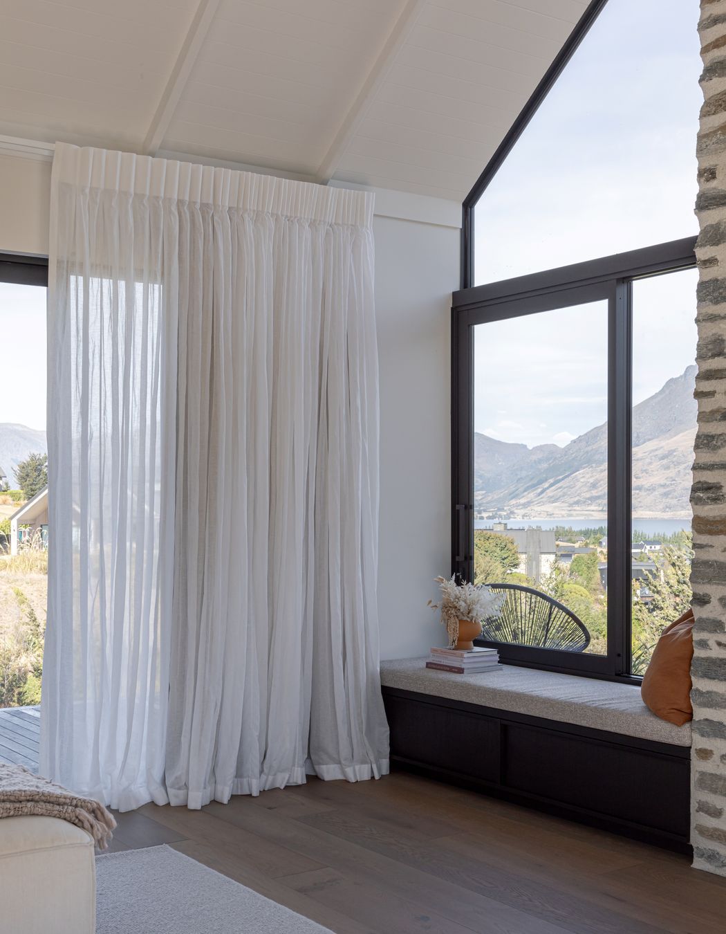 The window seat overlooks Lake Wakatipu