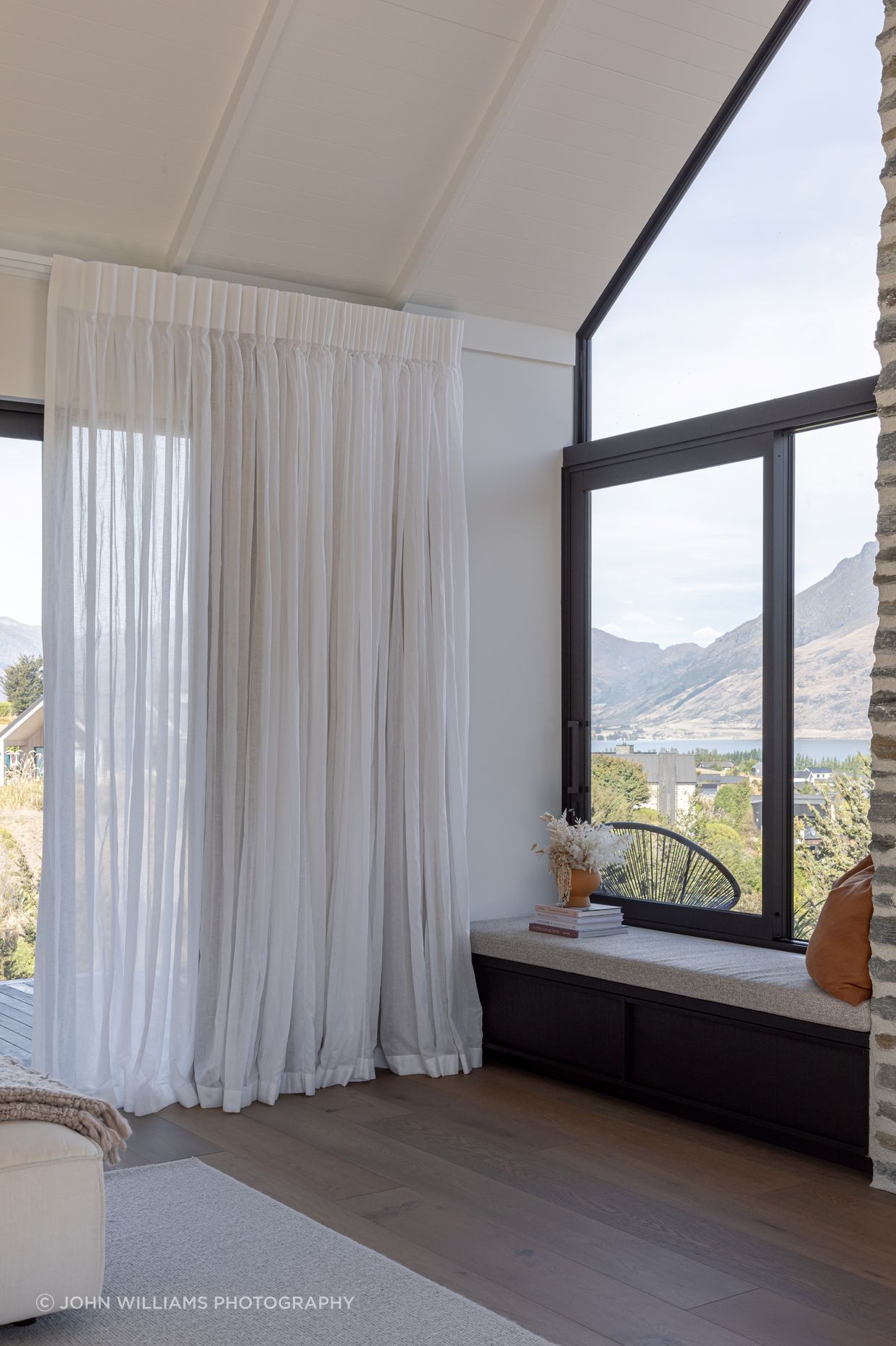 The window seat overlooks Lake Wakatipu