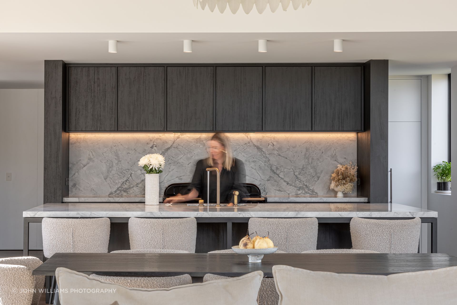 The kitchen is designed around social connection