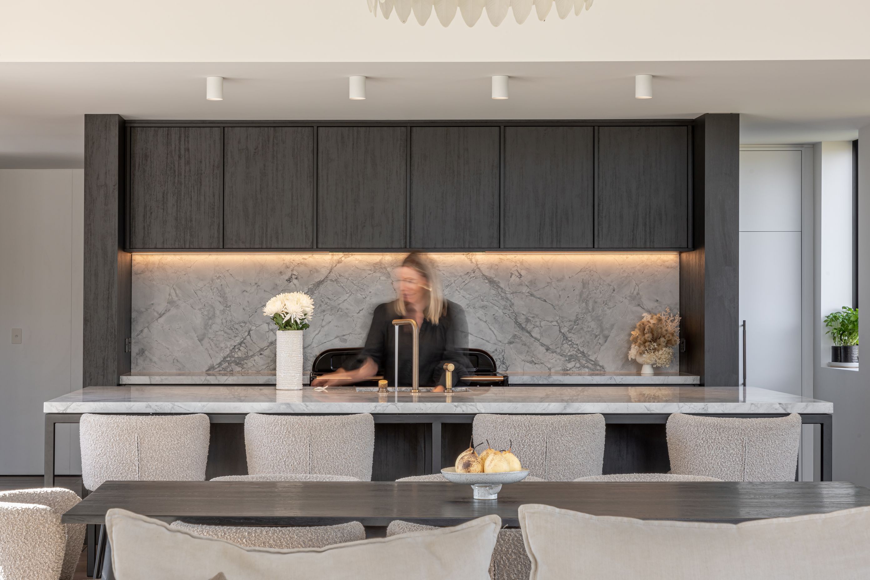 The kitchen is designed around social connection
