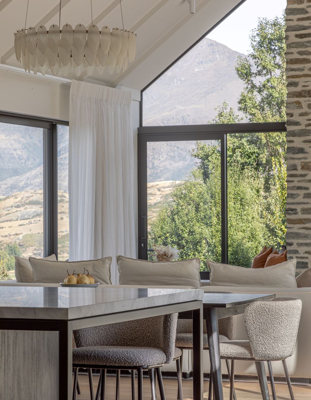 Full height glazing captures the mountain views