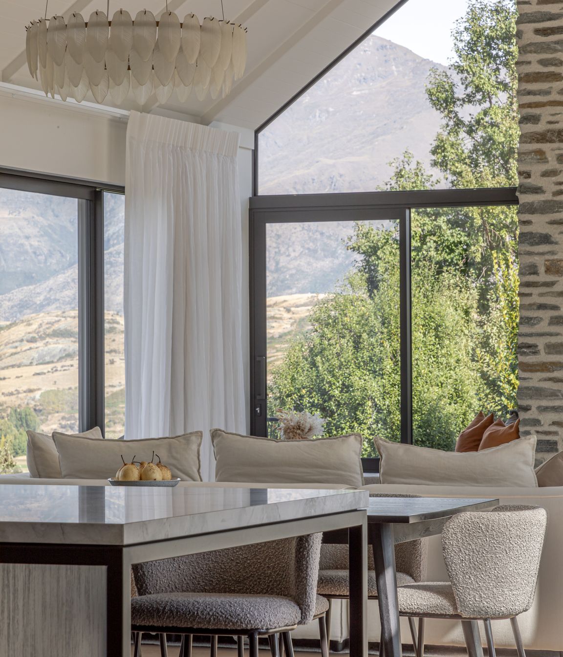 Full height glazing captures the mountain views