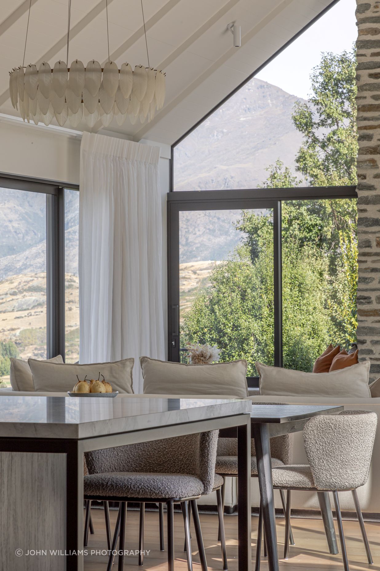 Full height glazing captures the mountain views