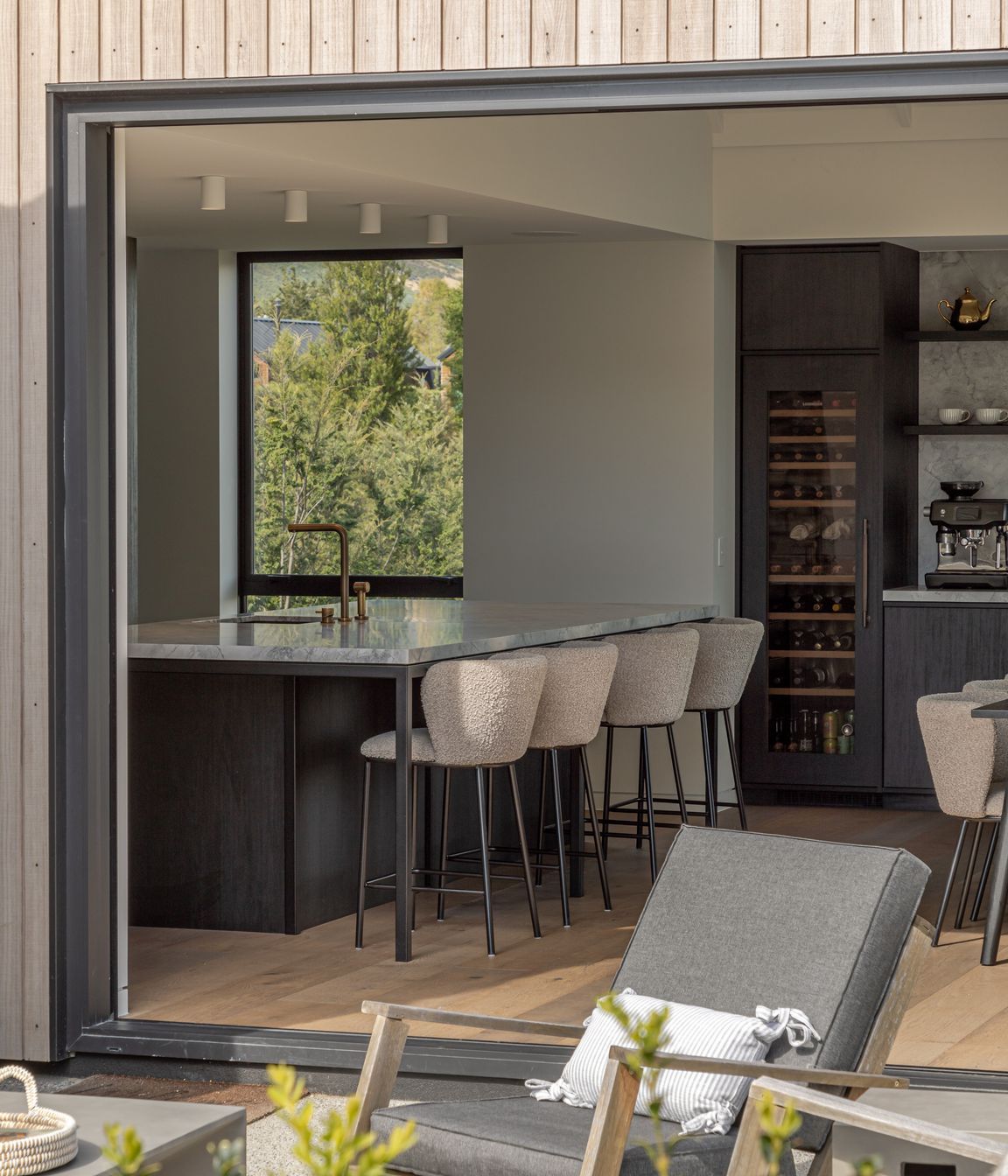Kitchen and dining open onto a north facing sunny terrace