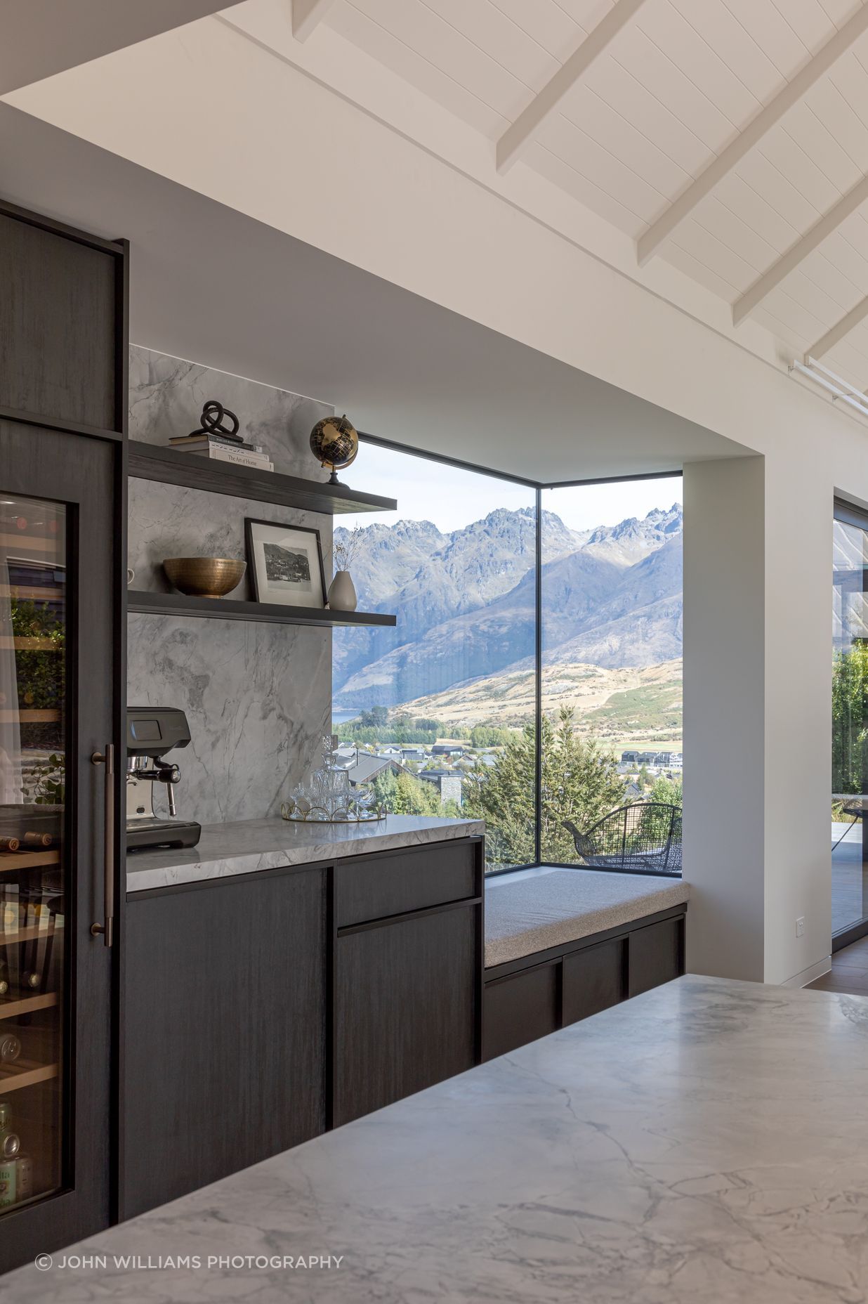 Window seat in handy proximity to coffee or wine...