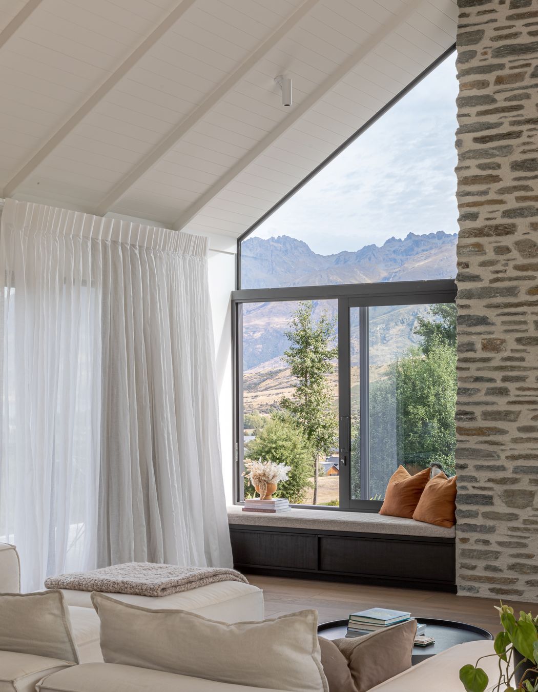 This family home blends contemporary design with the rustic cues of a traditional farmstead or country home