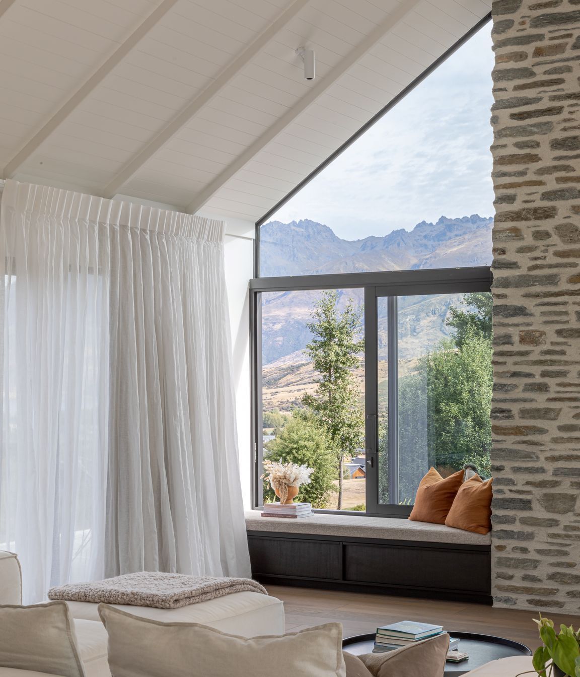 This family home blends contemporary design with the rustic cues of a traditional farmstead or country home