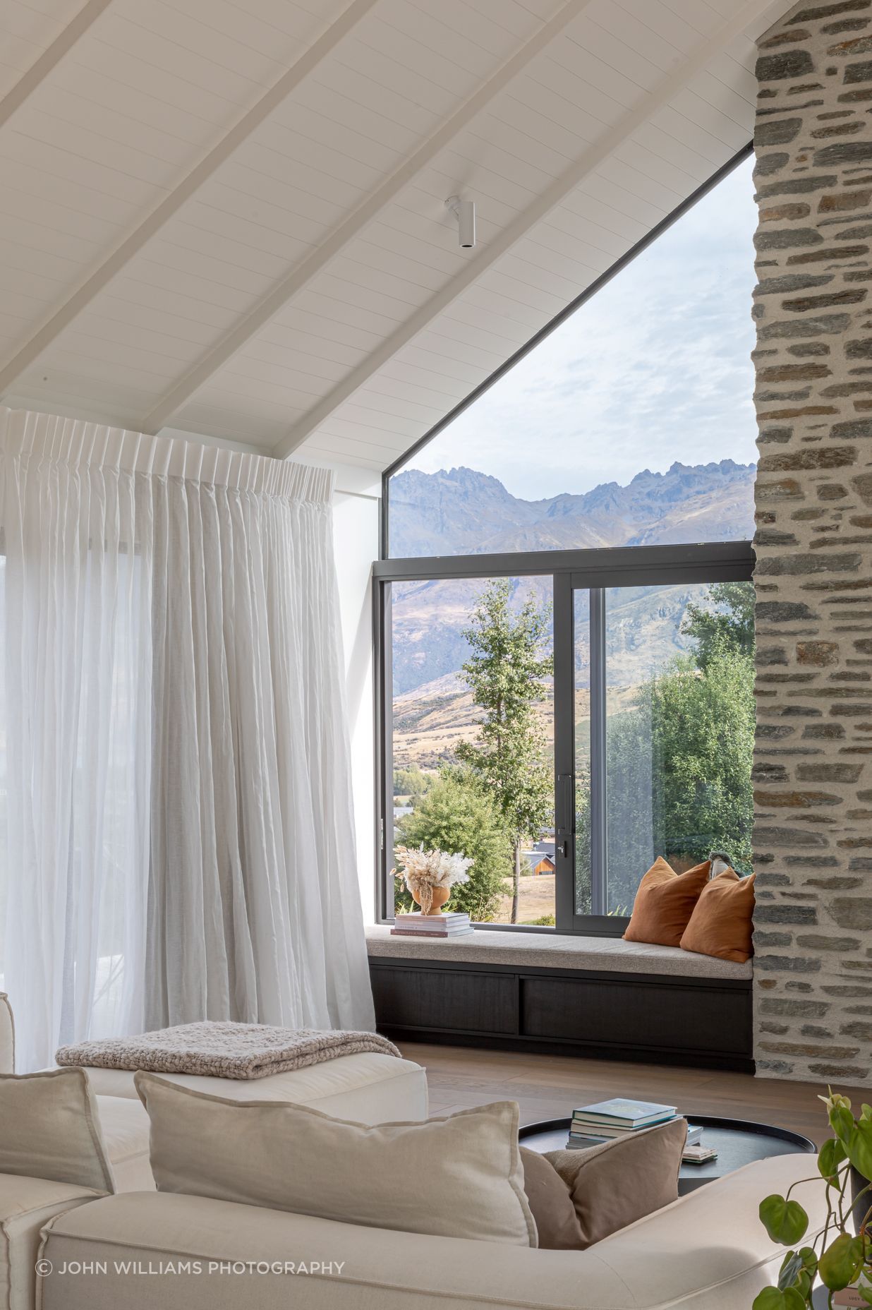 This family home blends contemporary design with the rustic cues of a traditional farmstead or country home