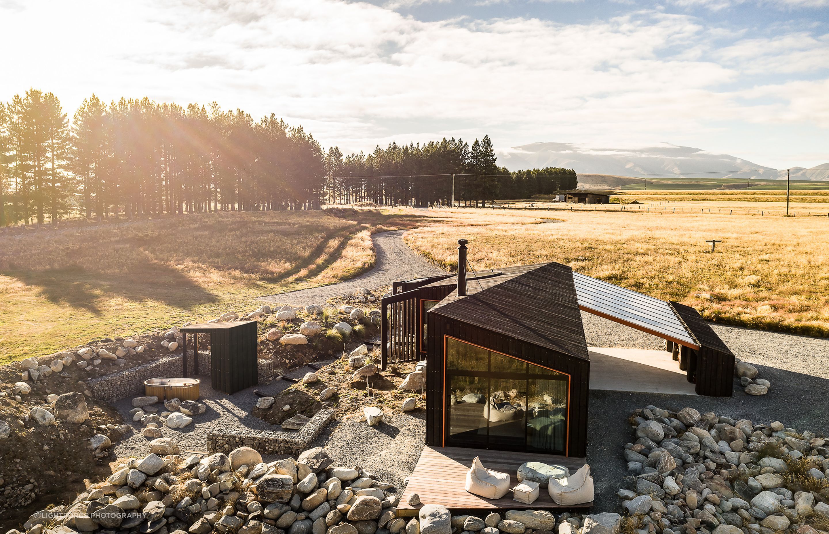 Entry to the home is via the carport, with its ClearVue roof extending down from the cabin roofline before being 'anchored' at the other end to the hidden storage block and bike racks.