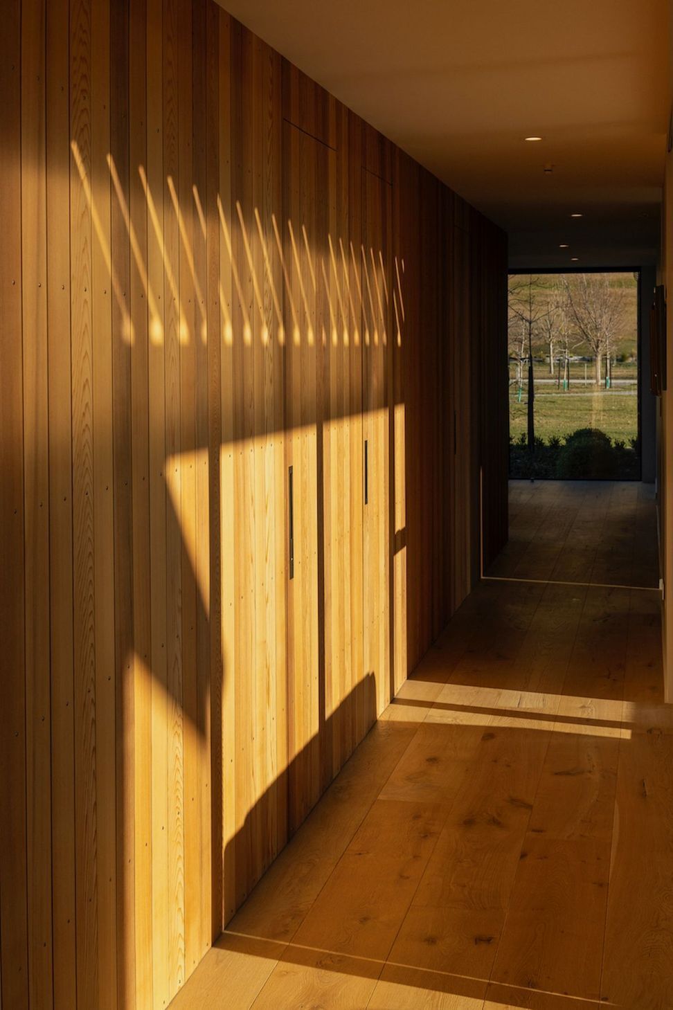 Hillend-Station-Houseinteriorwood-paneled-door-hallwaygallery.jpeg