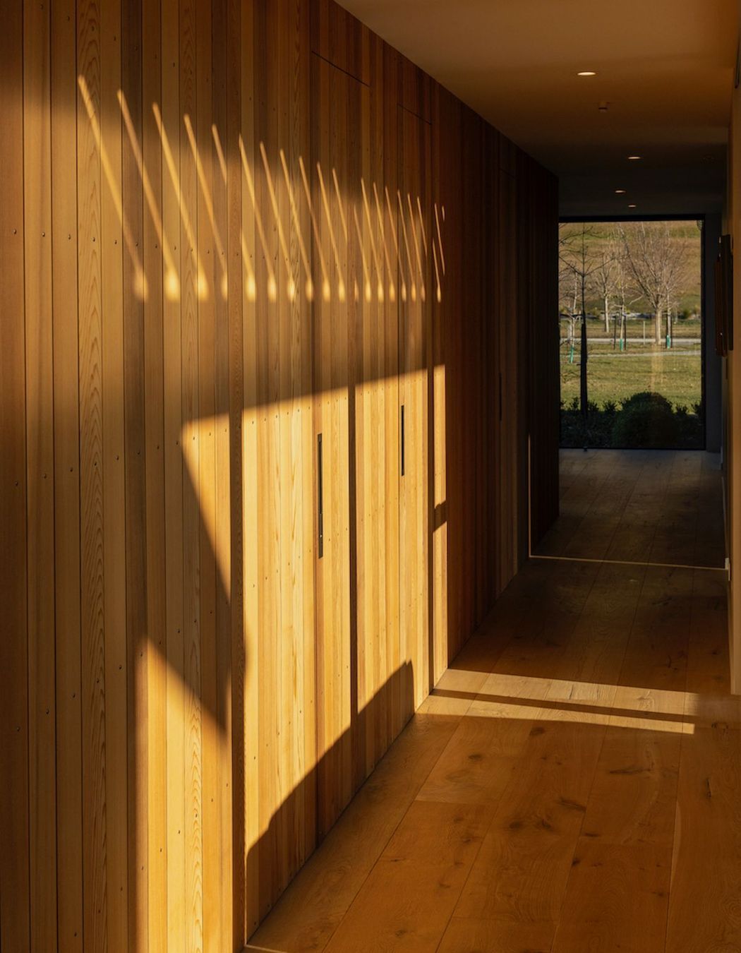 Hillend-Station-Houseinteriorwood-paneled-door-hallwaygallery.jpeg