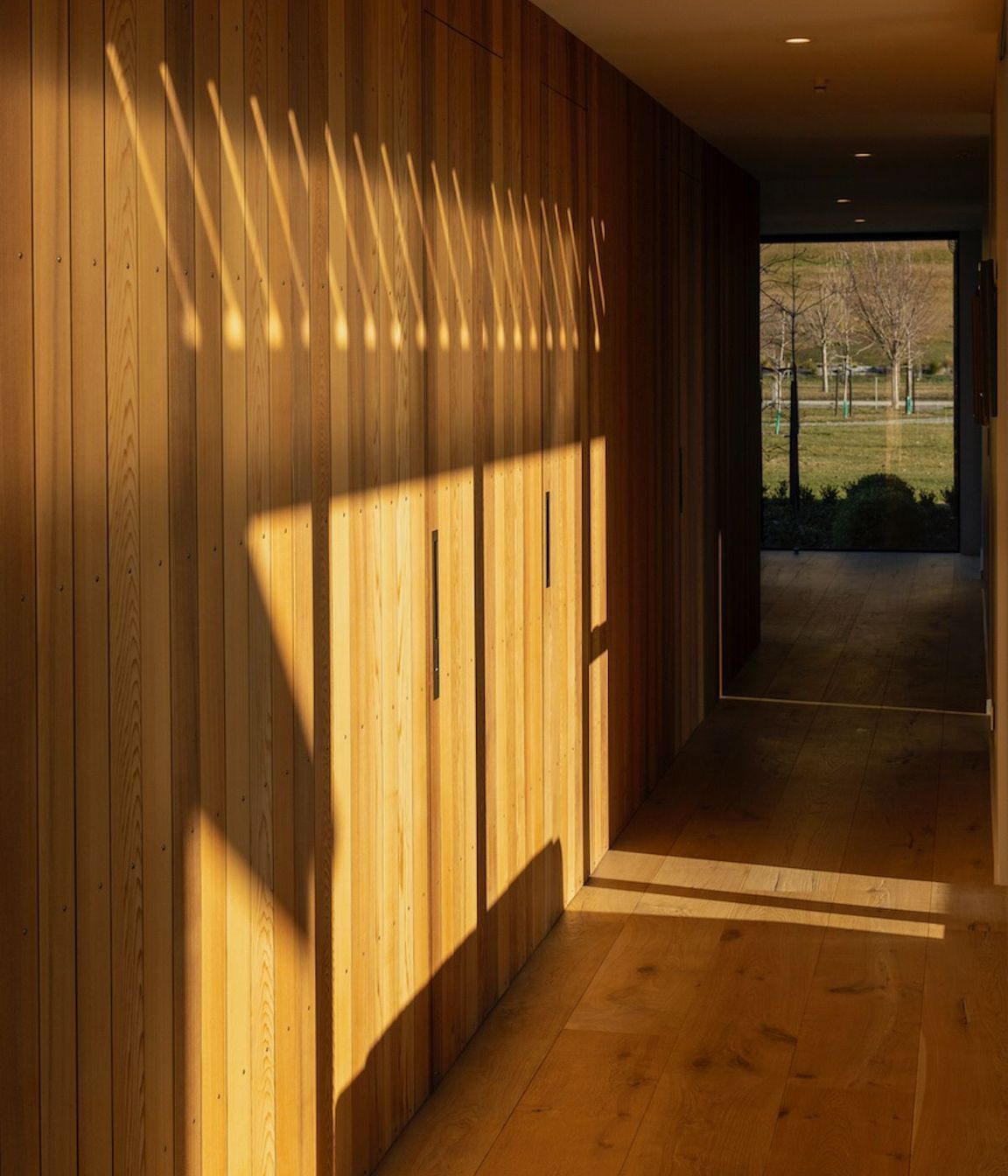 Hillend-Station-Houseinteriorwood-paneled-door-hallwaygallery.jpeg