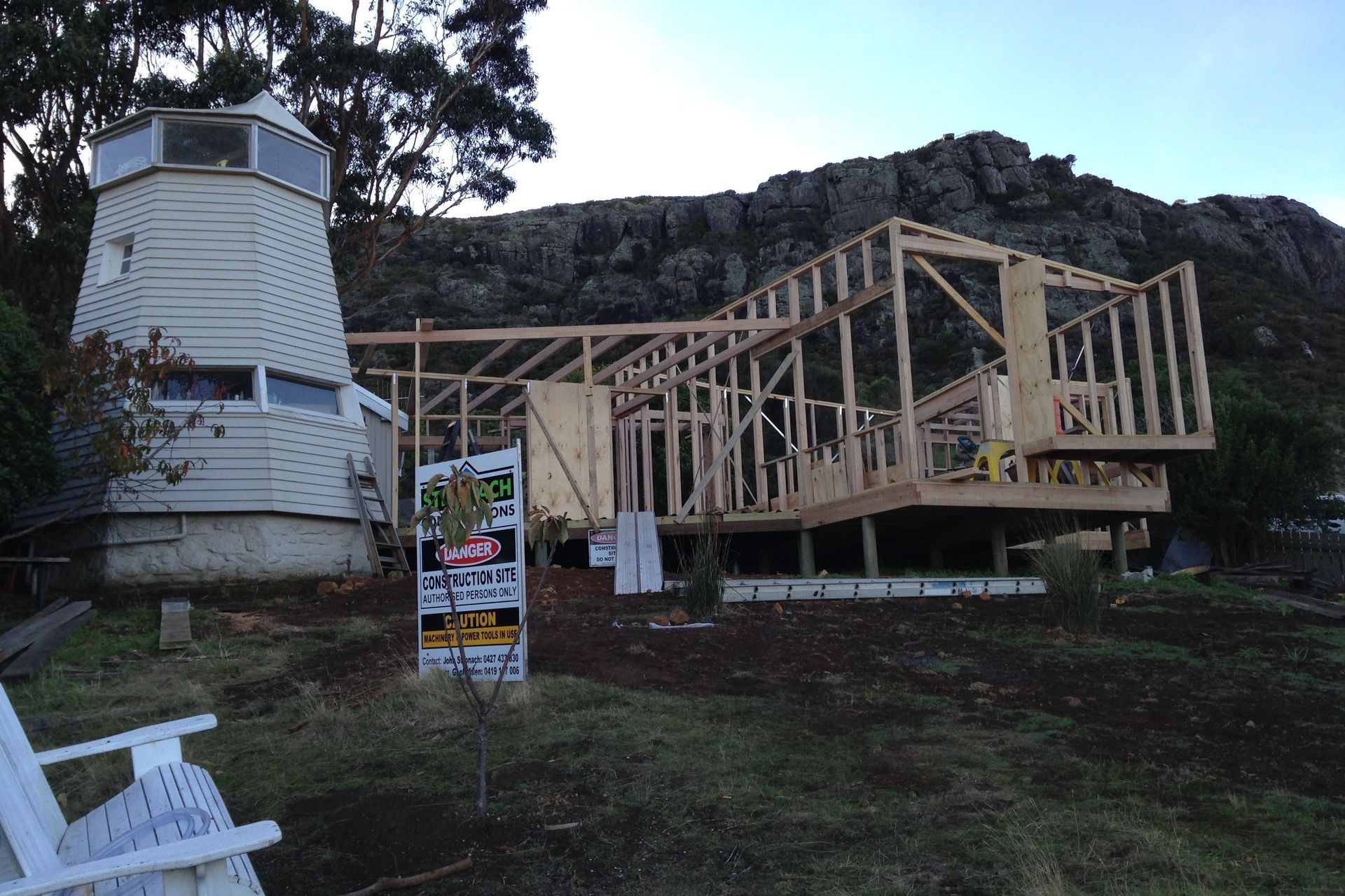 Framing under construction. Builders grew a few more grey hairs connecting to the irregular geometry of the windmill folly.