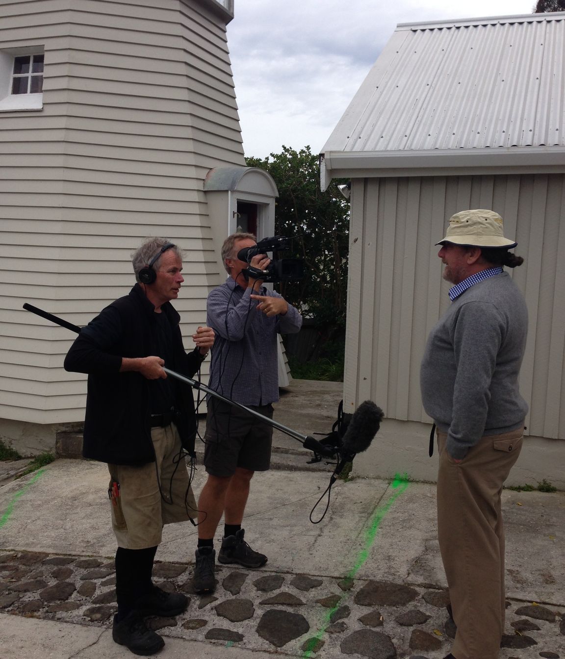 The owner, on the right, with some of the film crew from Gran Designs Australia